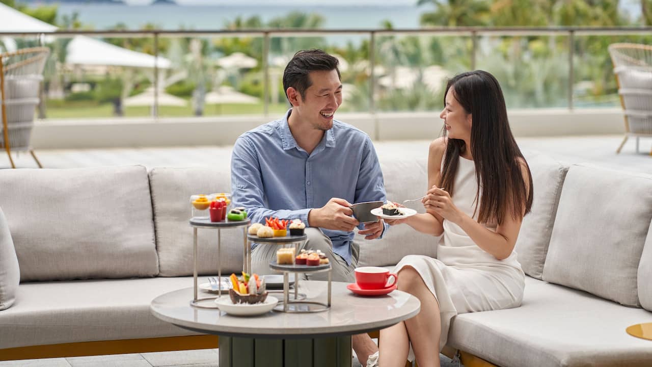 Couple Enjoying Afternoon Tea