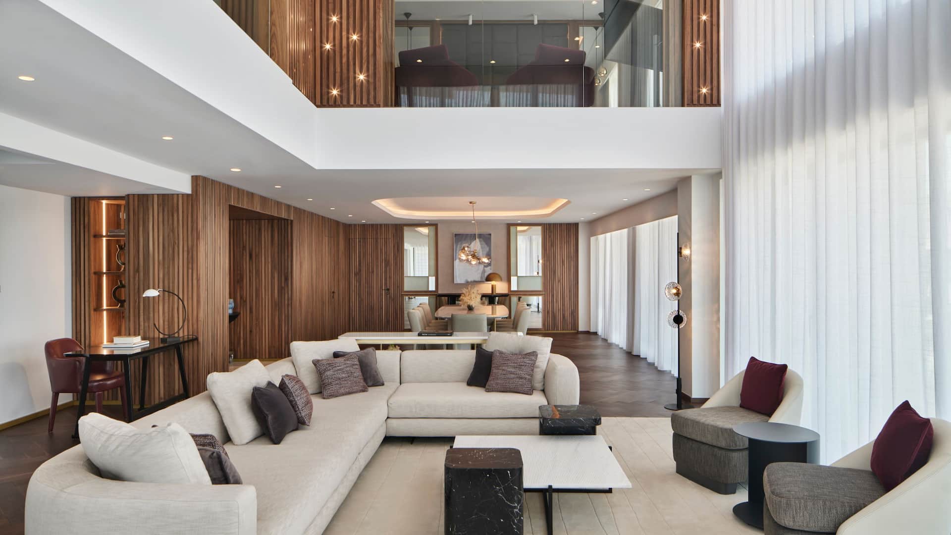 The luxuriously elegant two-level suite living room of the Grand Hyatt 5 star hotel in Athens Greece near Acropolis.
