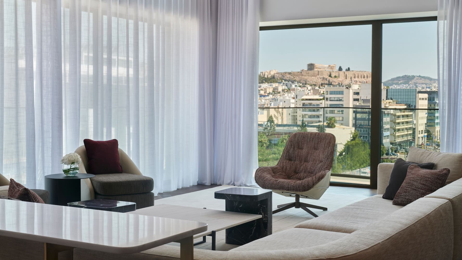 4 of 5 Grand Hyatt Athens Two Level Living Room Acropolis View