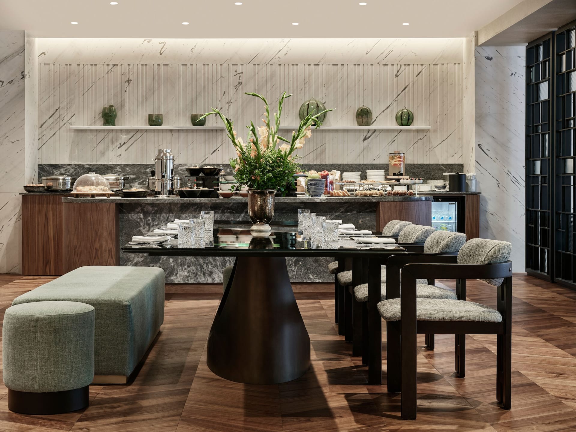 The Grand Club Lounge dining table & buffet counter at Grand Hyatt, a 5-star hotel with gourmet dining near Athens Acropolis.