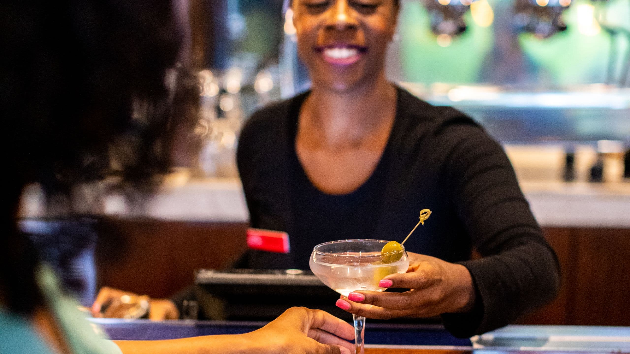 Hyatt Centric Midtown Atlanta Bartender Serving Drinks