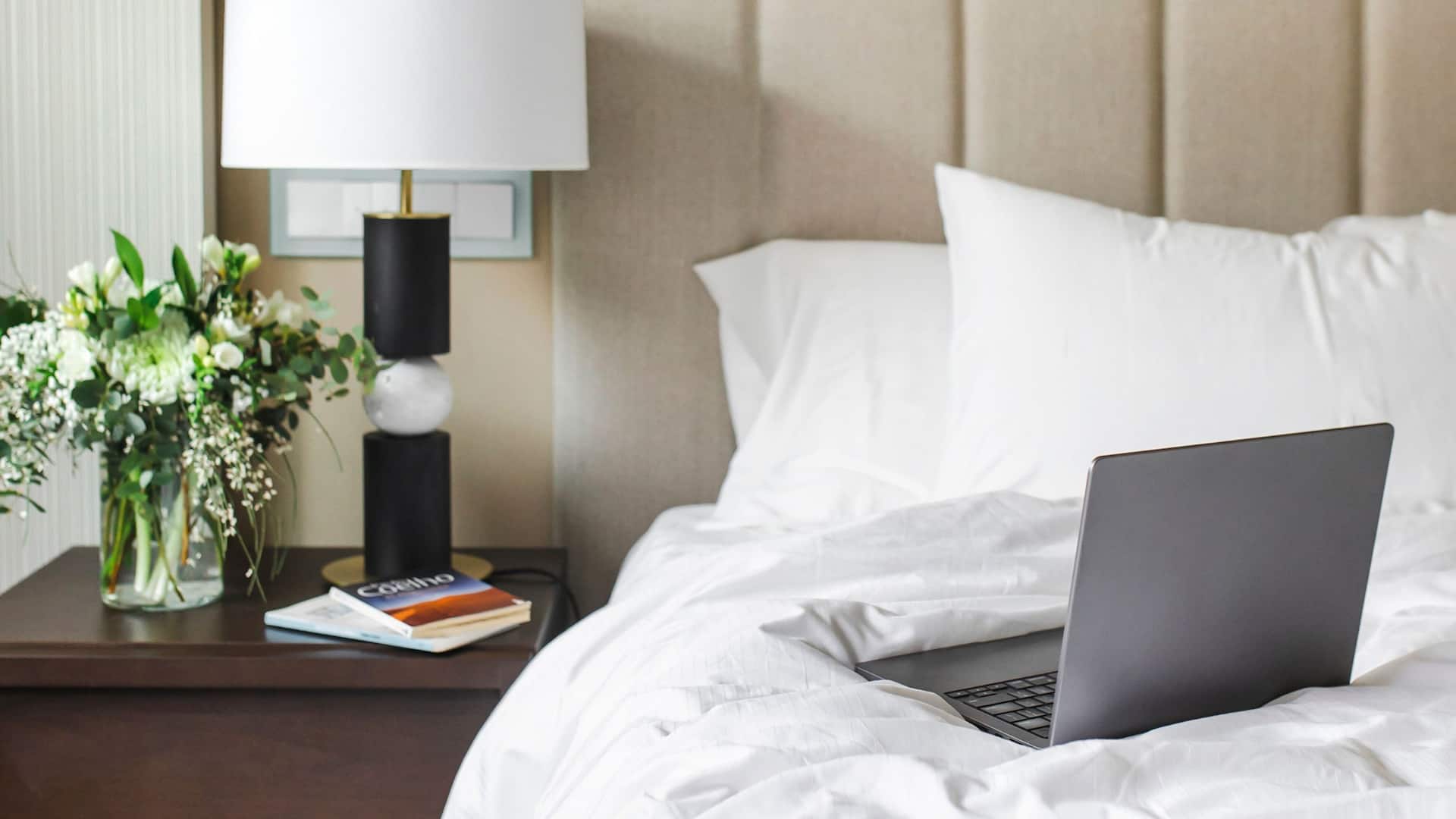 Hyatt Regency Madrid Residences Bed Laptop