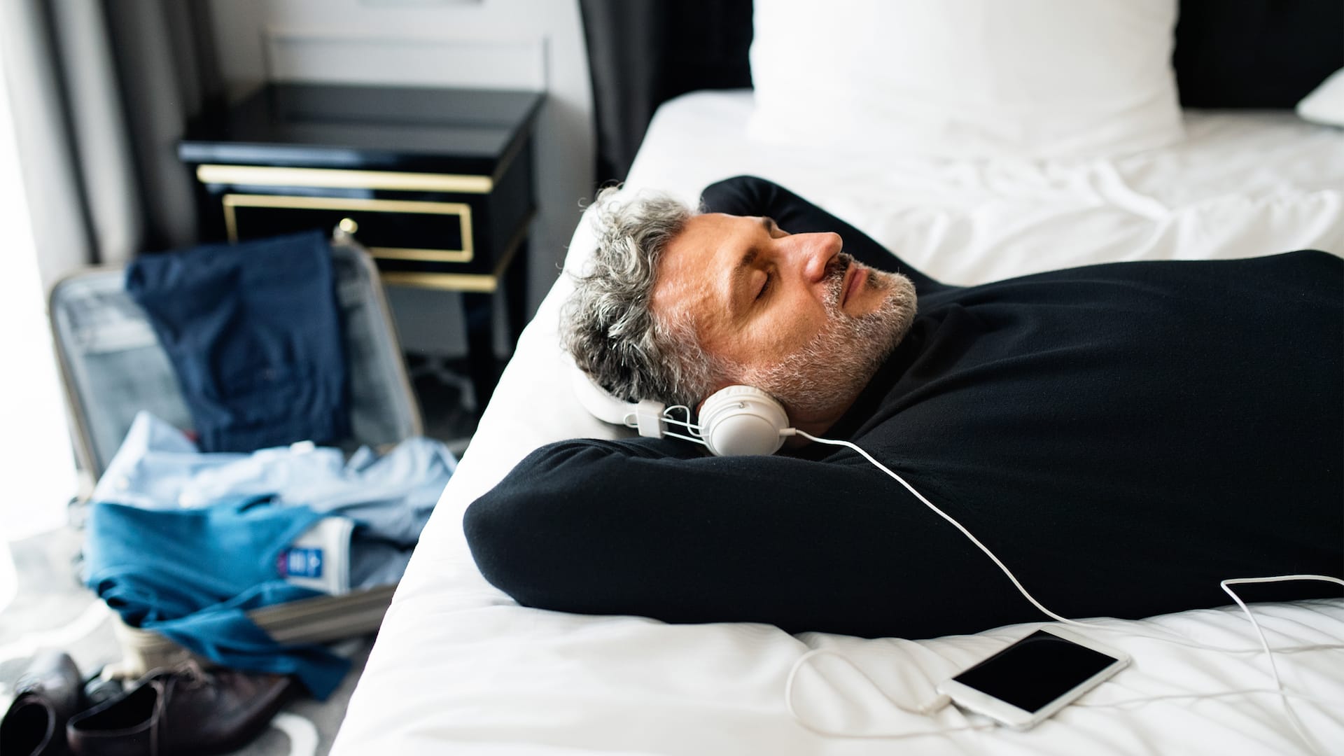 Man sleeping with headphones