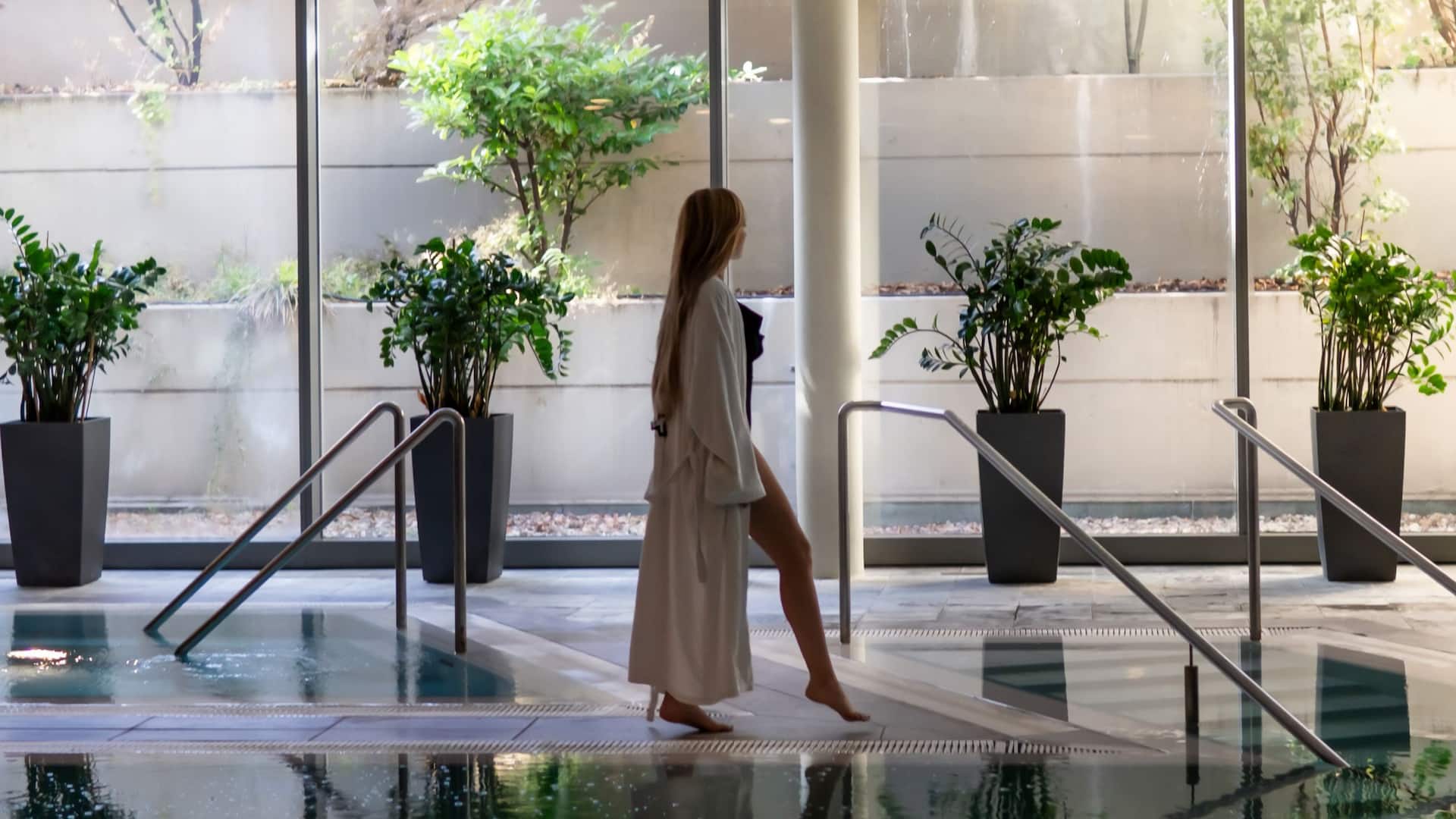 Hyatt Regency Mainz Woman Walking Along Pool Club Olympus
