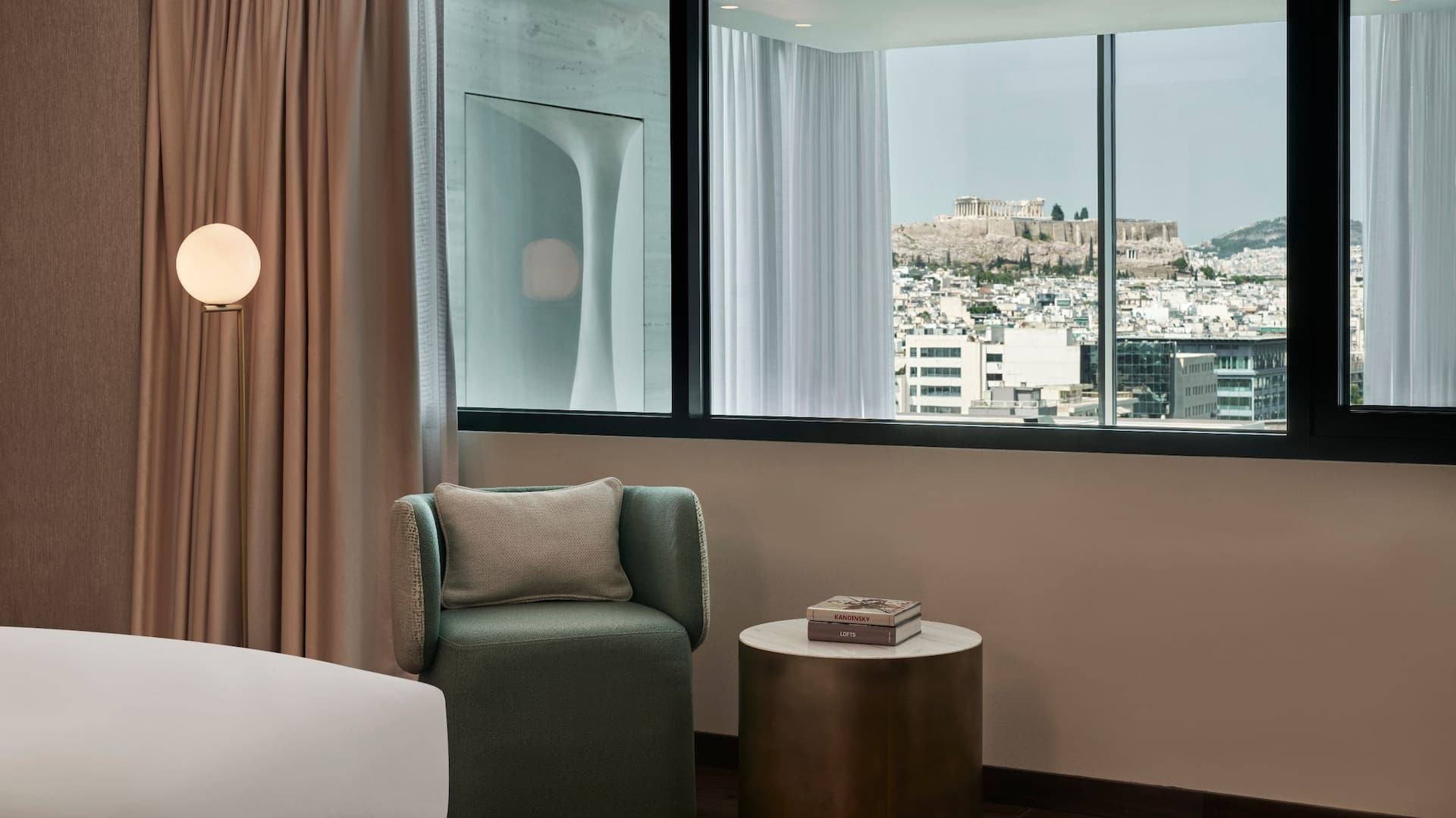 Luxurious penthouse bedroom at Grand Hyatt Athens, a 5-star hotel in Athens