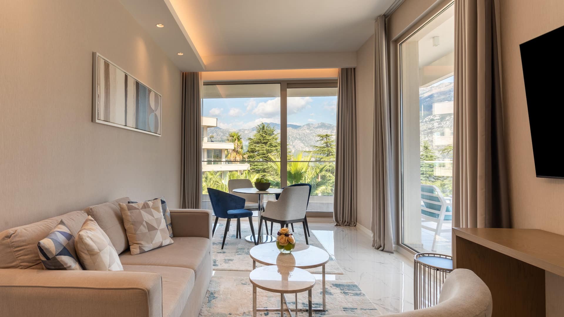 Luxury suite living room in Hyatt Regency Kotor Bay Resort, Montenegro, showcasing elegant furnishings and modern decor