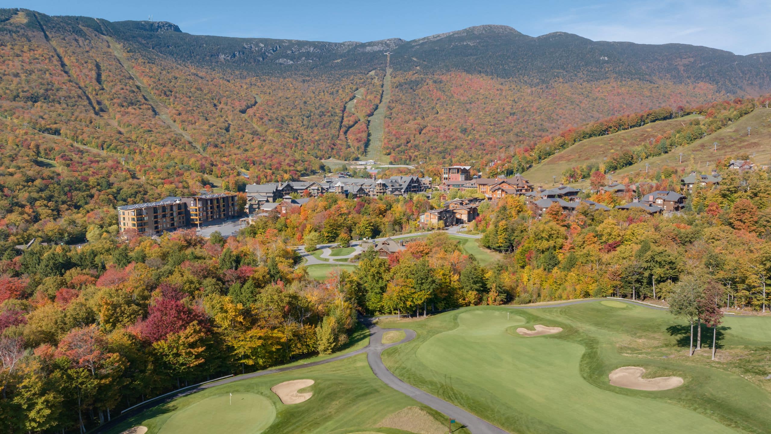 The Lodge at Spruce Peak Fall Golf Aerial