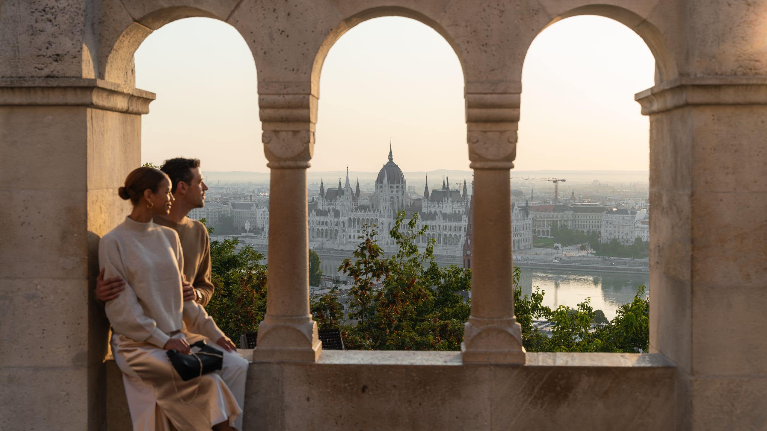 Párisi Udvar Hotel Budapest Couple Sitting In Budapest With A View