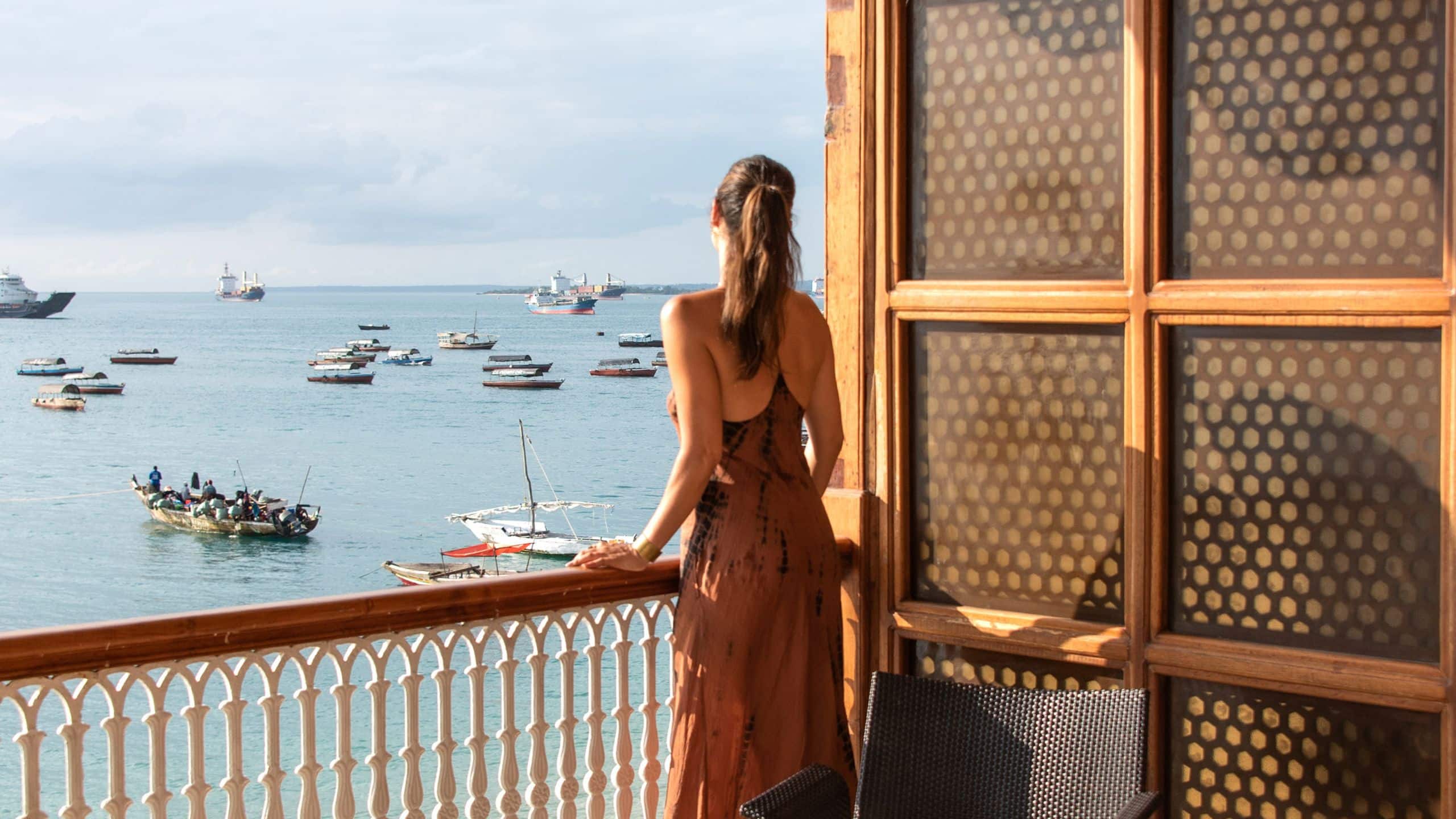 Park Hyatt Zanzibar Guestroom Woman Looking Out Balcony