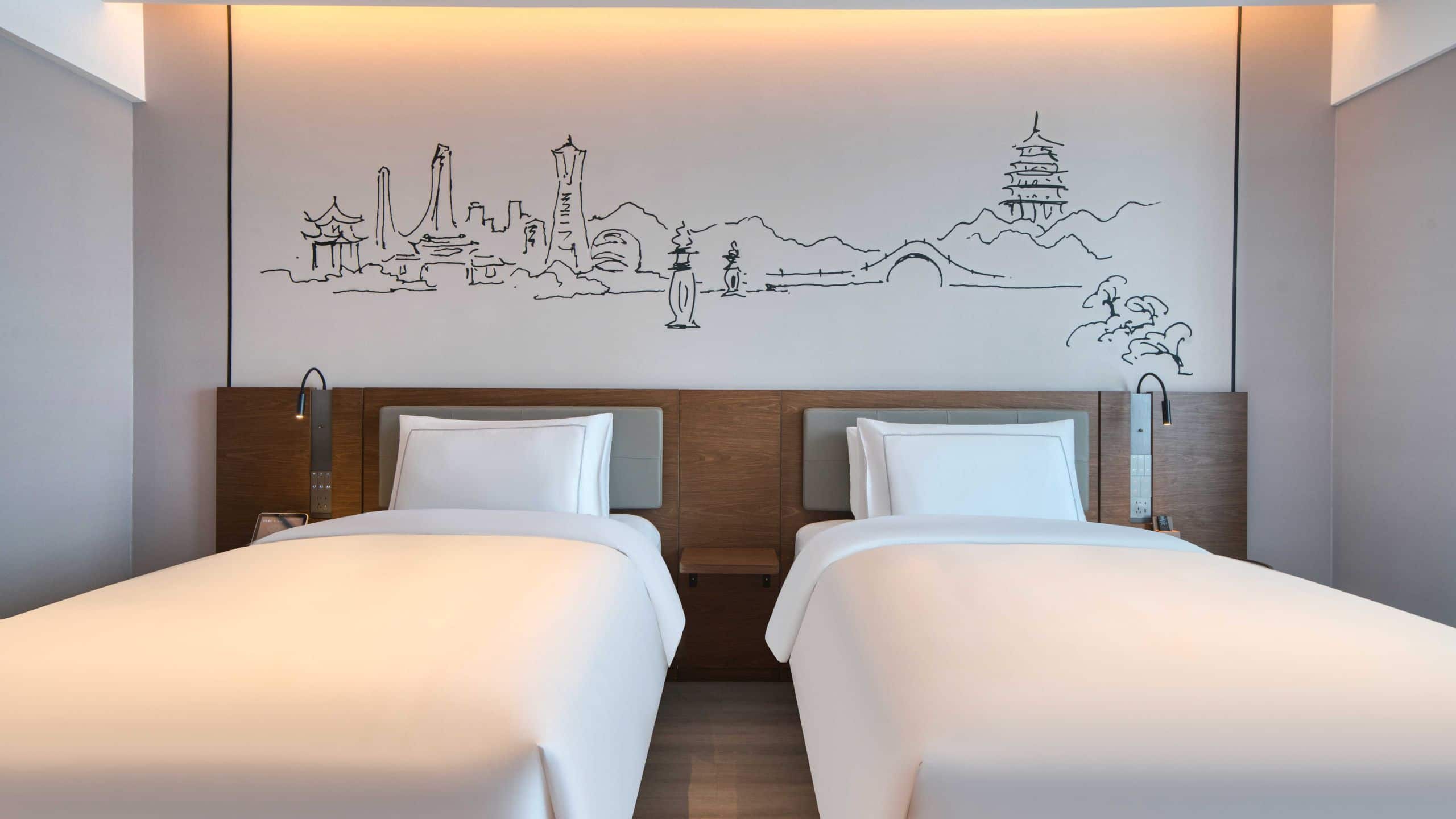 3 of 7 UrCove Hangzhou North Grand Canal Business Deluxe Two Twin Beds Guestroom Detail