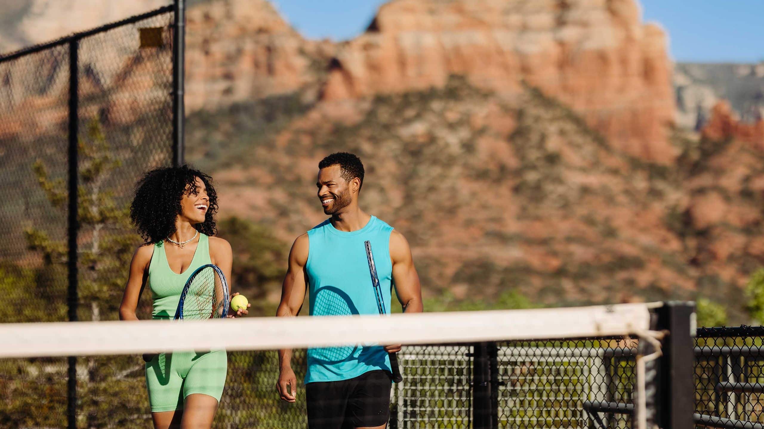 Hyatt Vacation Club at Piñon Pointe Couple Playing Tennis