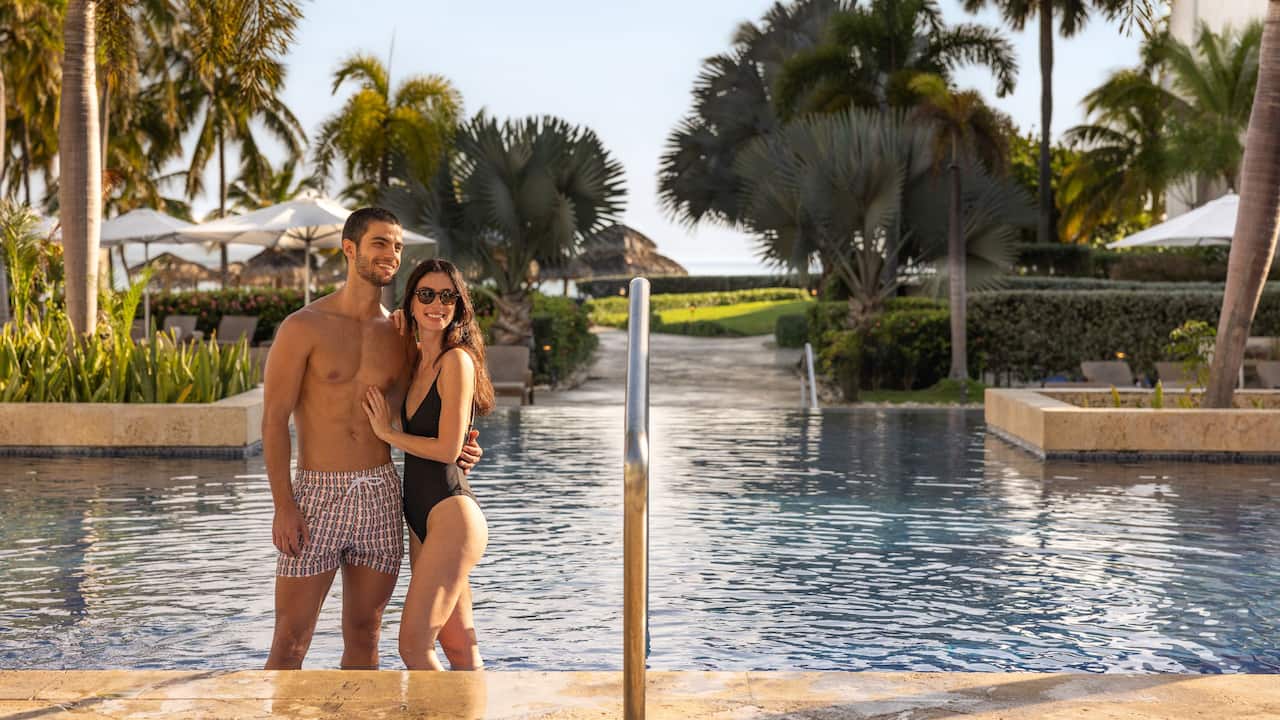 Adult Main Pool Couple In Pool