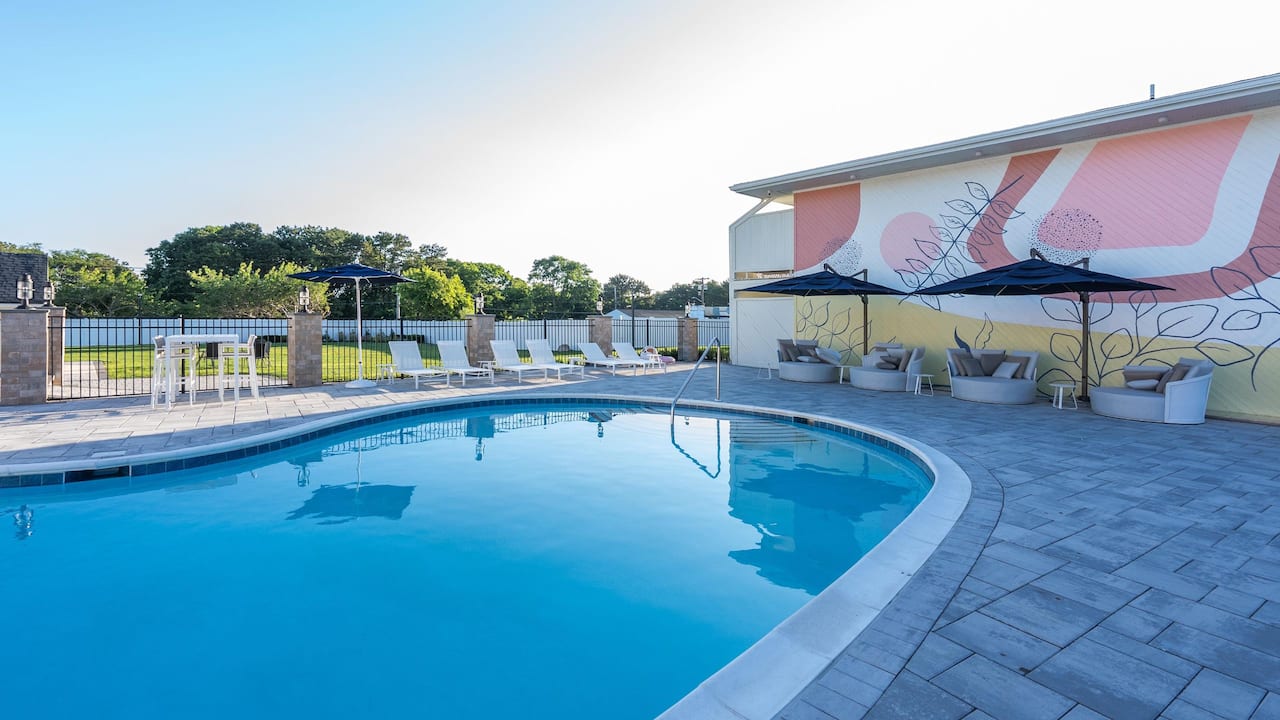 Swimming Pool And Lounge Chairs