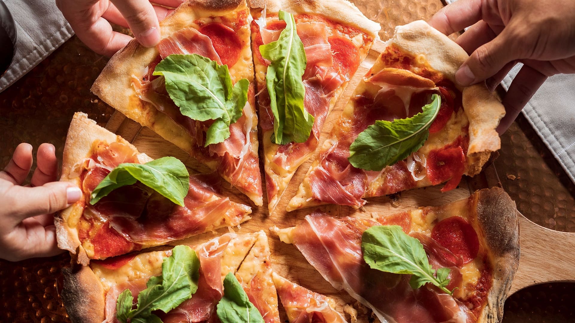 Hyatt Regency Merida Friends Sharing Prosciutto Pizza