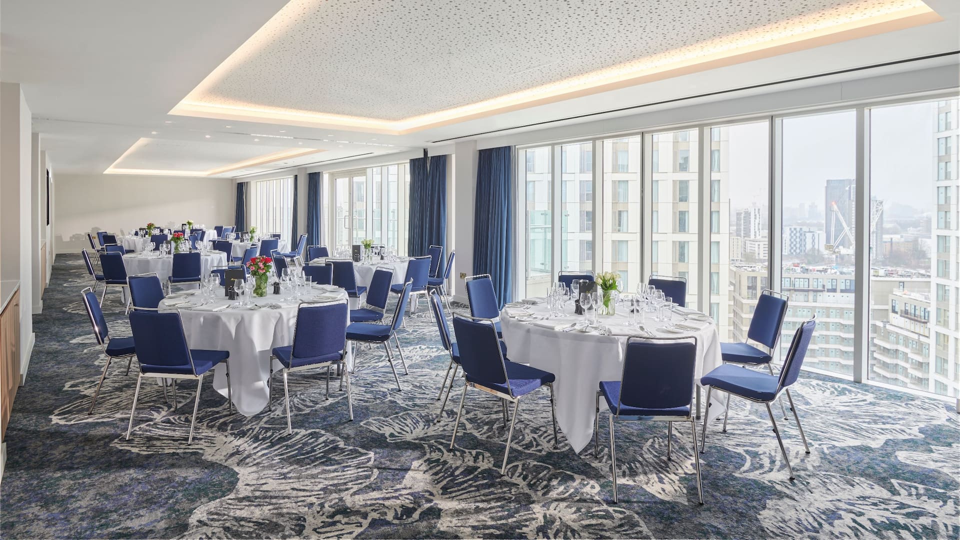 1 of 4 Hyatt Regency London Stratford Lea Suite Round Tables Setup