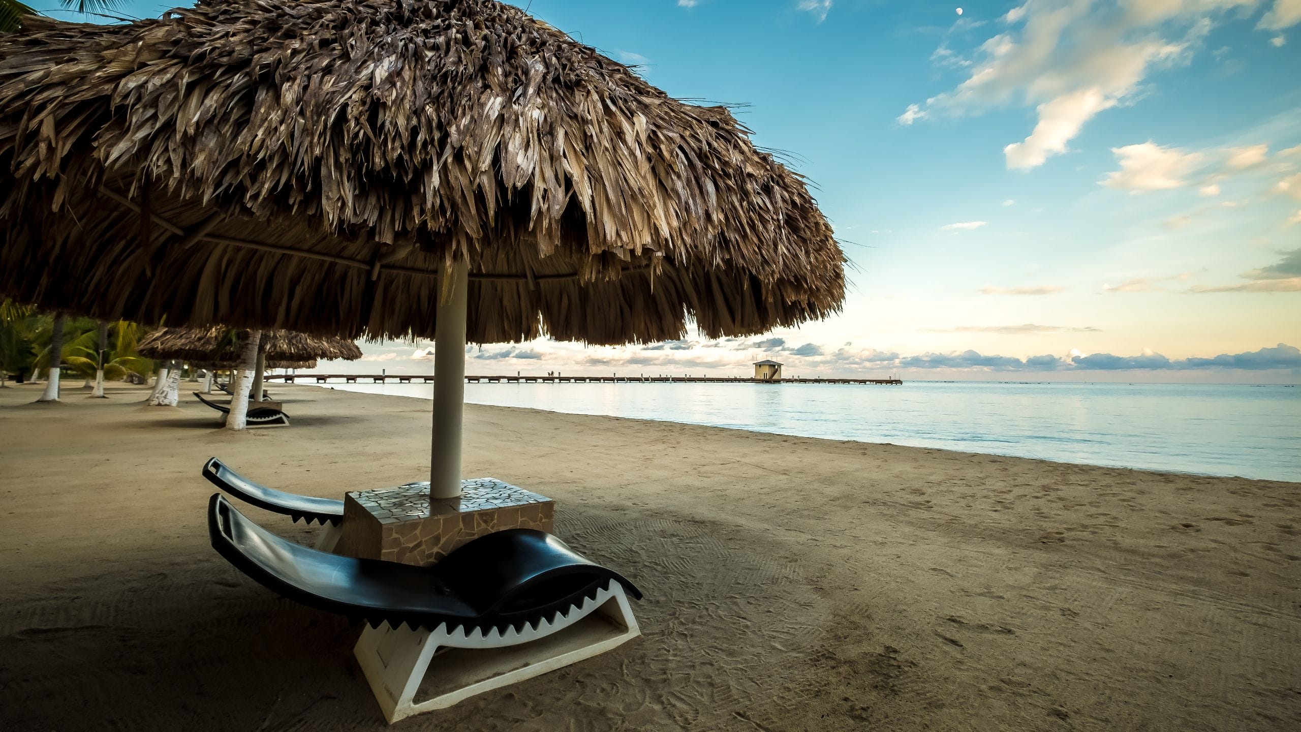 Placencia Resort Beach Palapa And Lounge Chairs