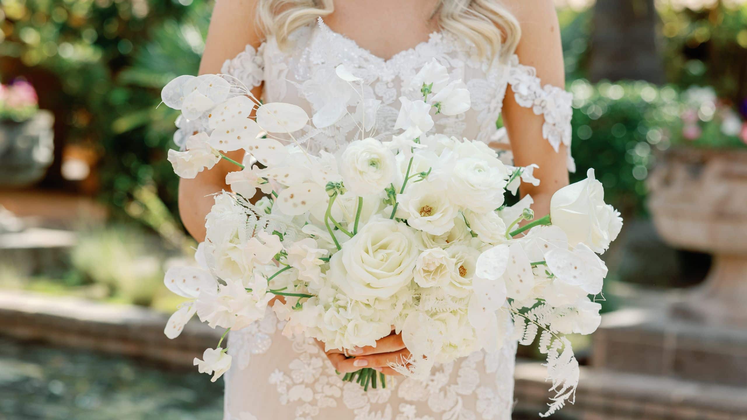 Royal Palms Resort and Spa Bride With White Rose Bouquet