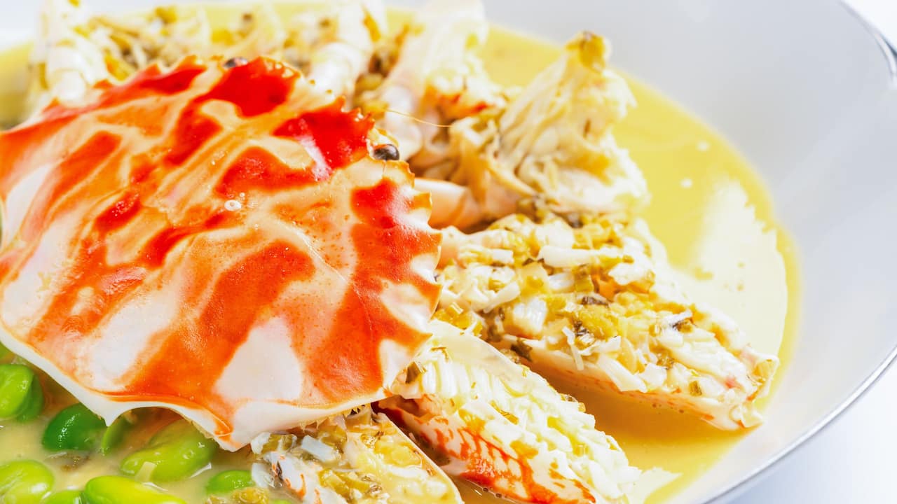 Sizzling Red Crab Green Fava Beans Pickled Cabbage