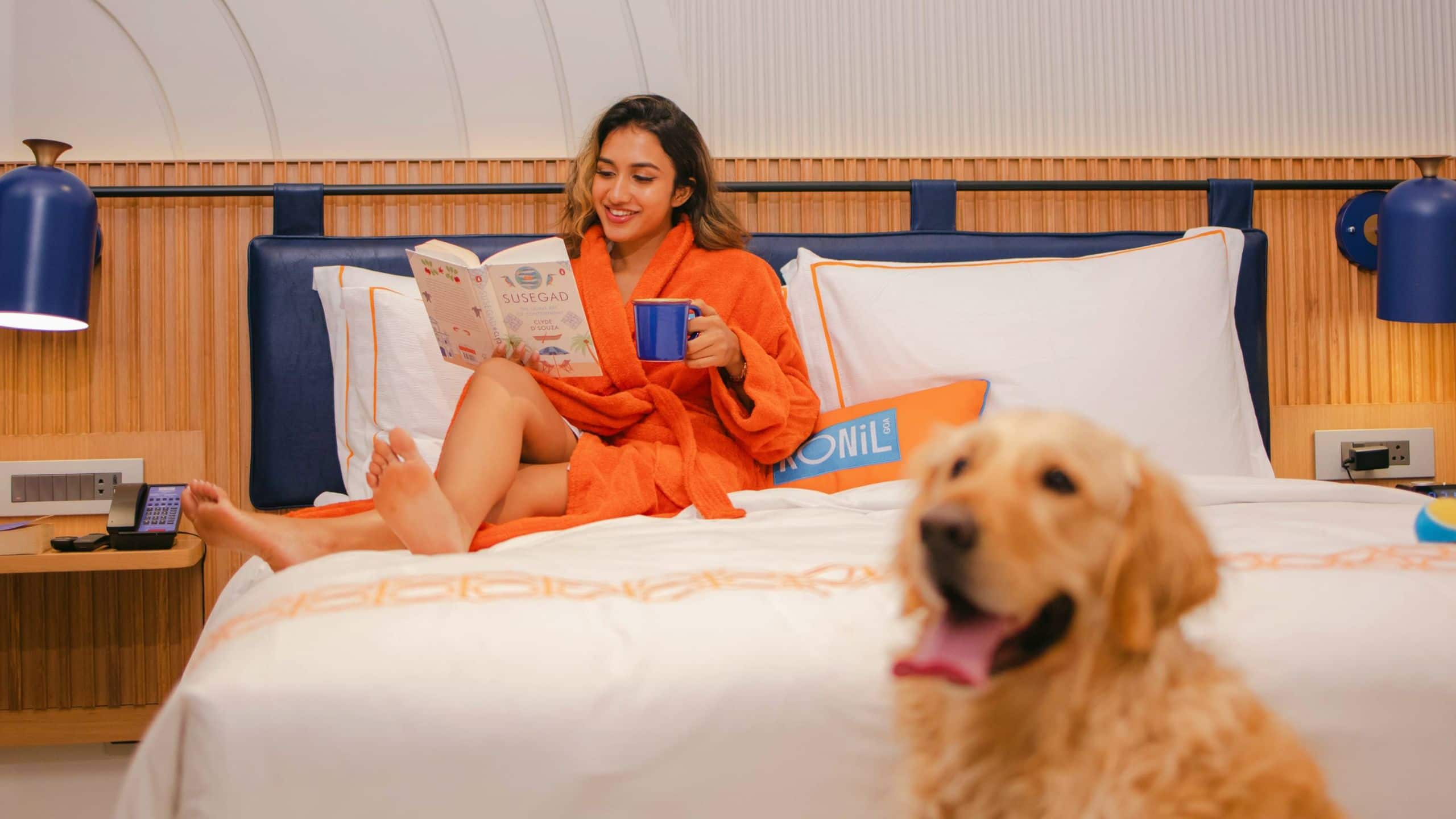 Ronil Goa Guestroom Pet Friendly Woman Relaxing