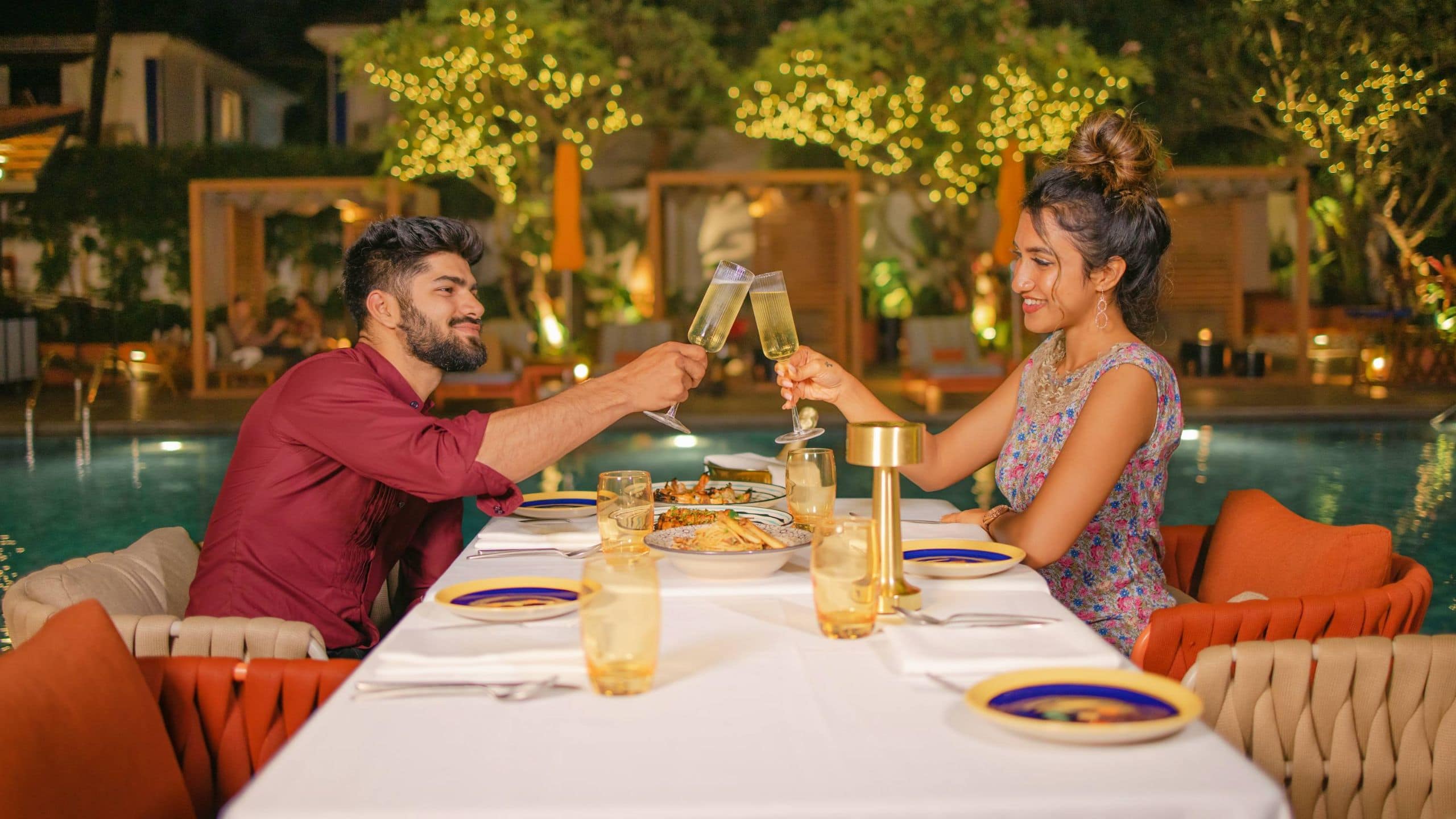 Ronil Goa Couple Pool Side Dining Evening