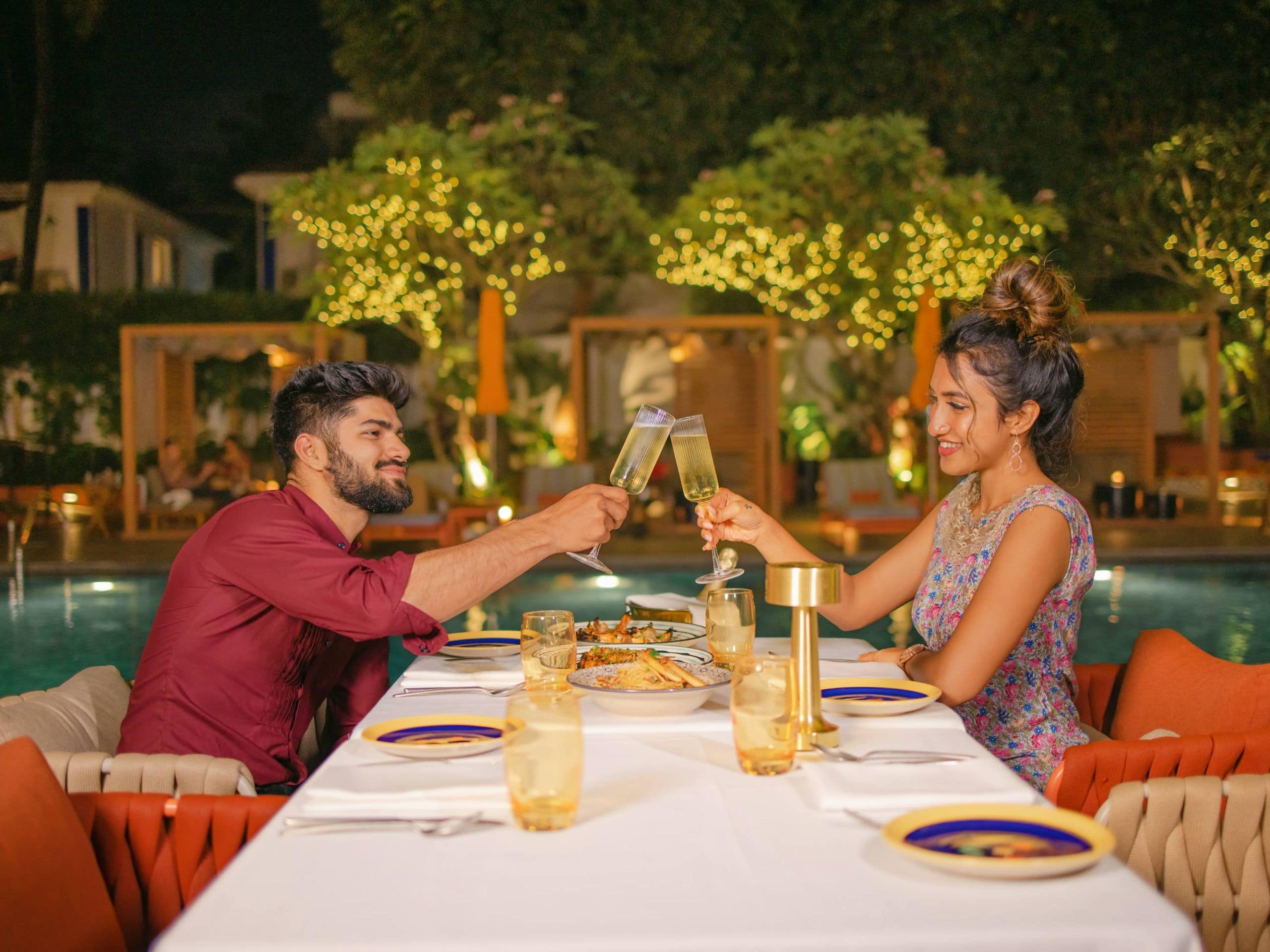 Ronil Goa Couple Pool Side Dining Evening