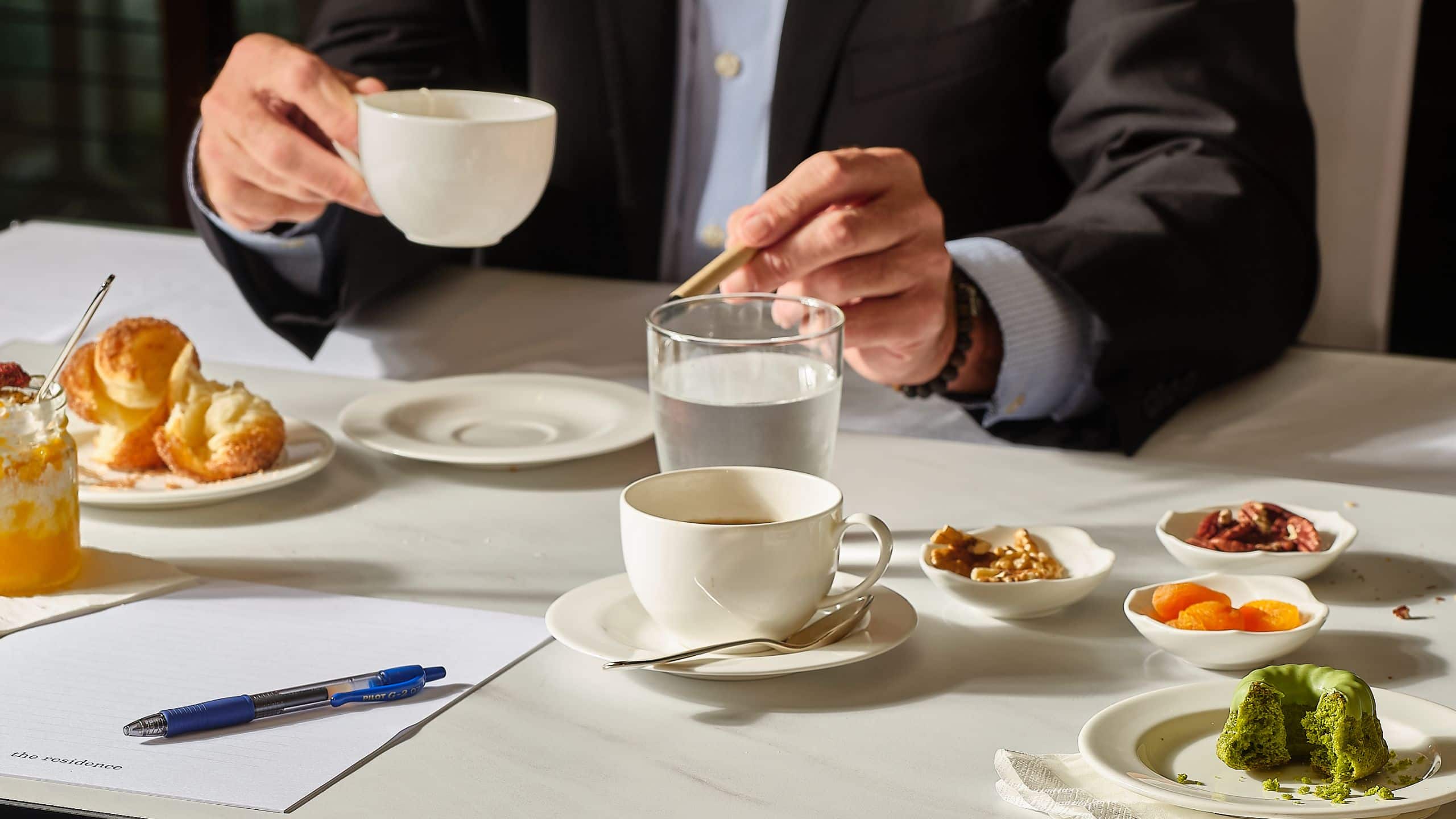 Global Event Guest With Coffee