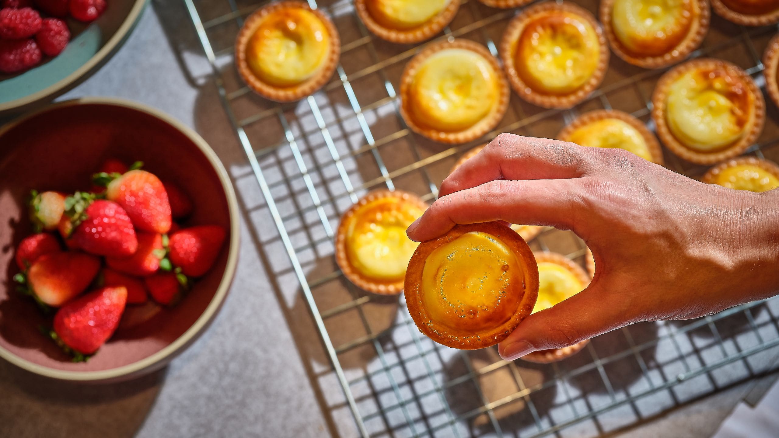 2 of 3 Global Cheese Tarts With Berries And Hand