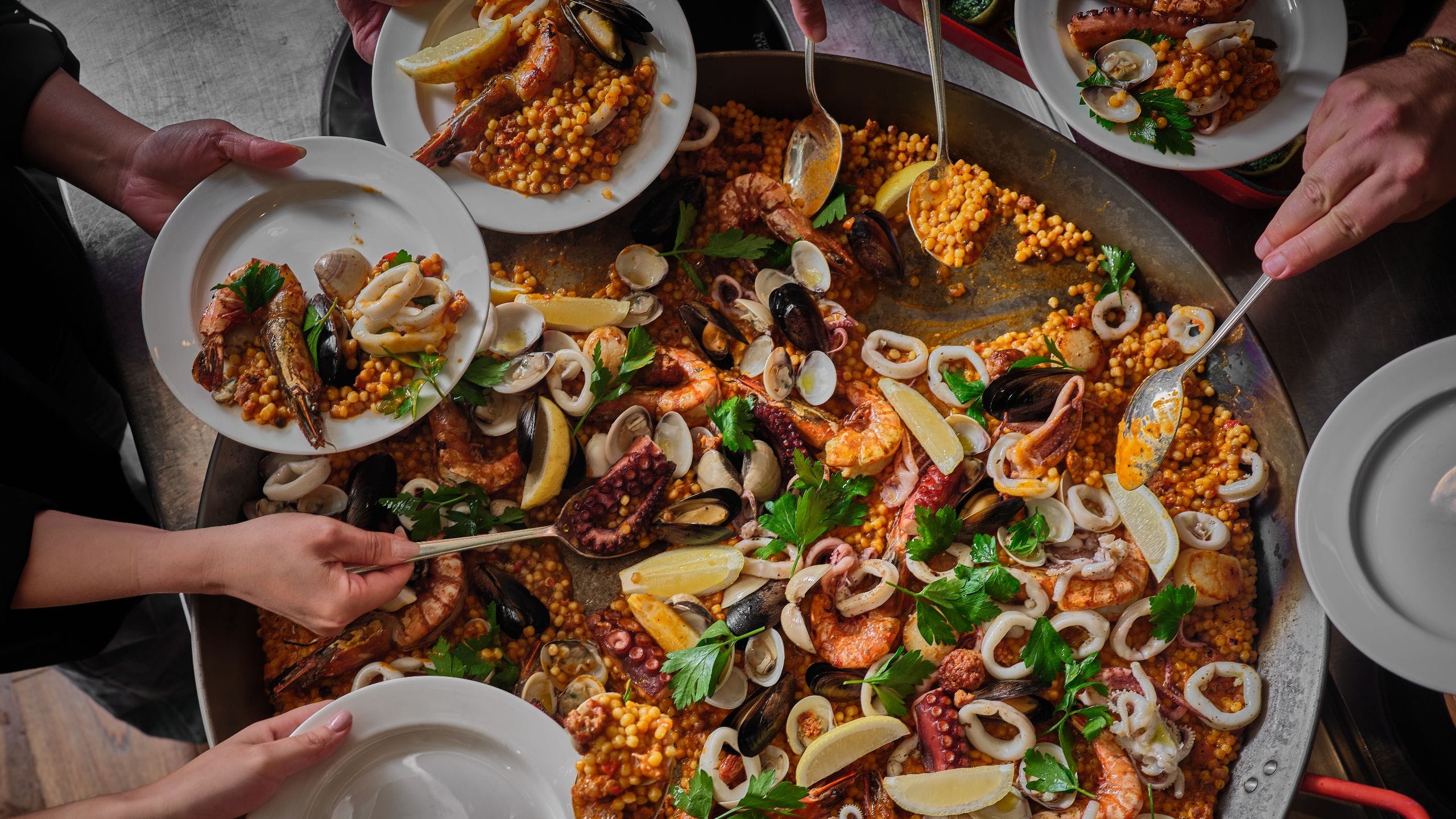Global Paella Buffet Serving