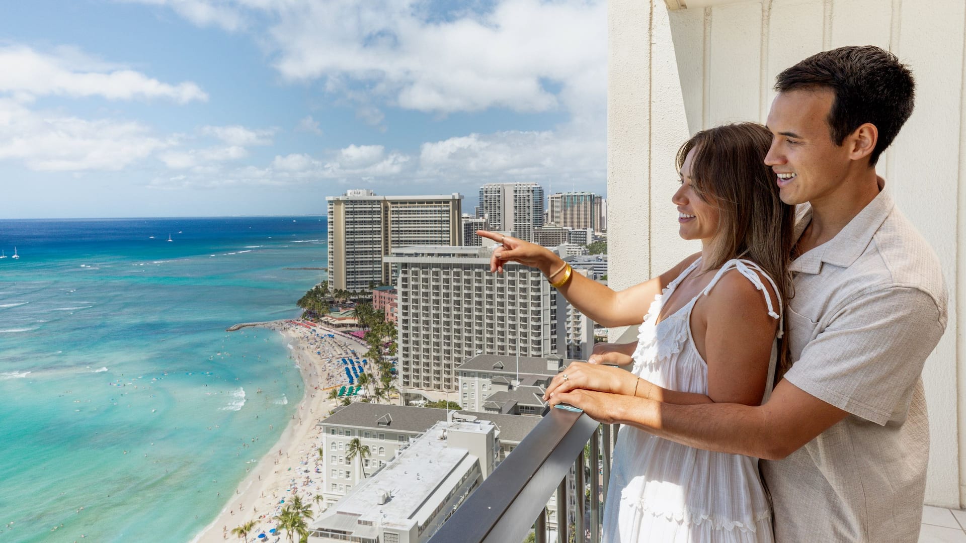 Hyatt Regency Waikiki Beach Resort and Spa Couple On Oceanfront Balcony With Beach