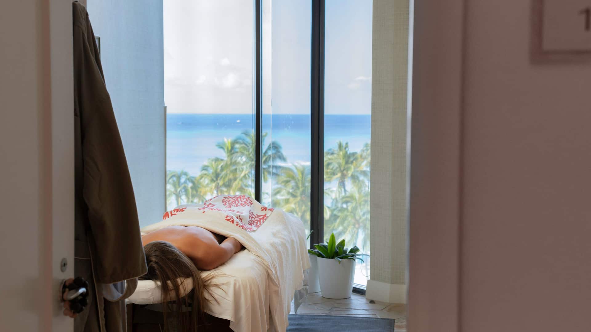 Hyatt Regency Waikiki Beach Resort and Spa Female On Massage Chair In Treatment Room At