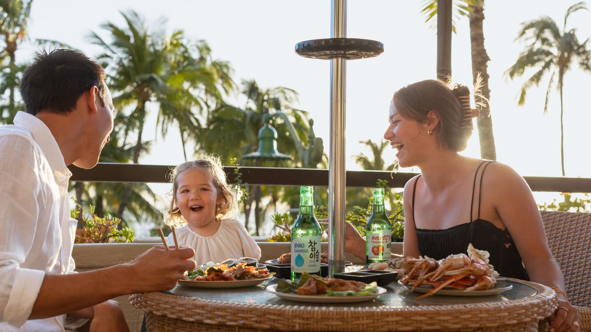 Hyatt Regency Waikiki Beach Resort and Spa Family Having Dinner At The Buffet At Hyatt