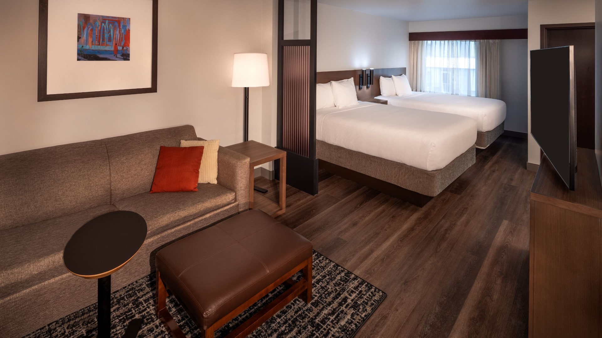 Hyatt Place Seattle/Downtown Guestroom Double Queen Beds Seating Area