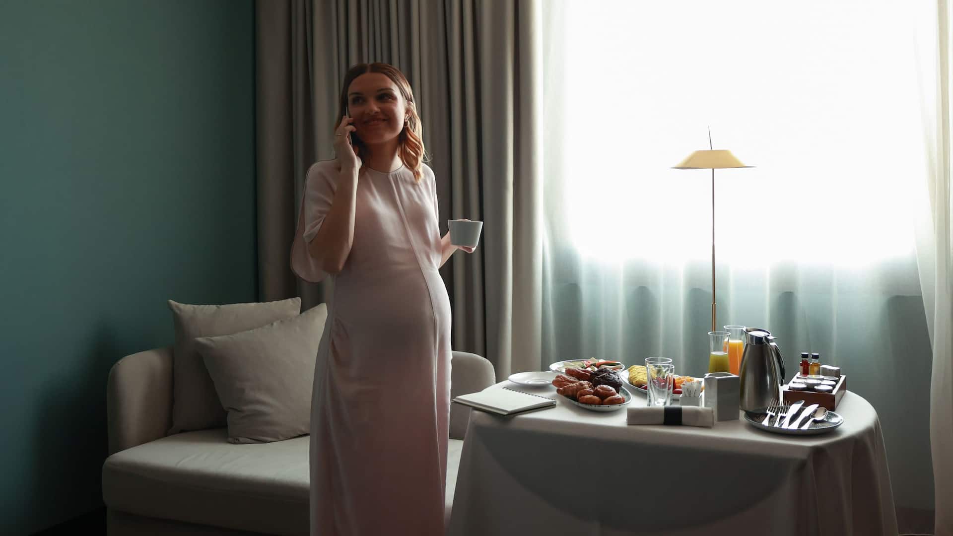 1 of 2 Grand Hyatt Barcelona Woman Having Room Service