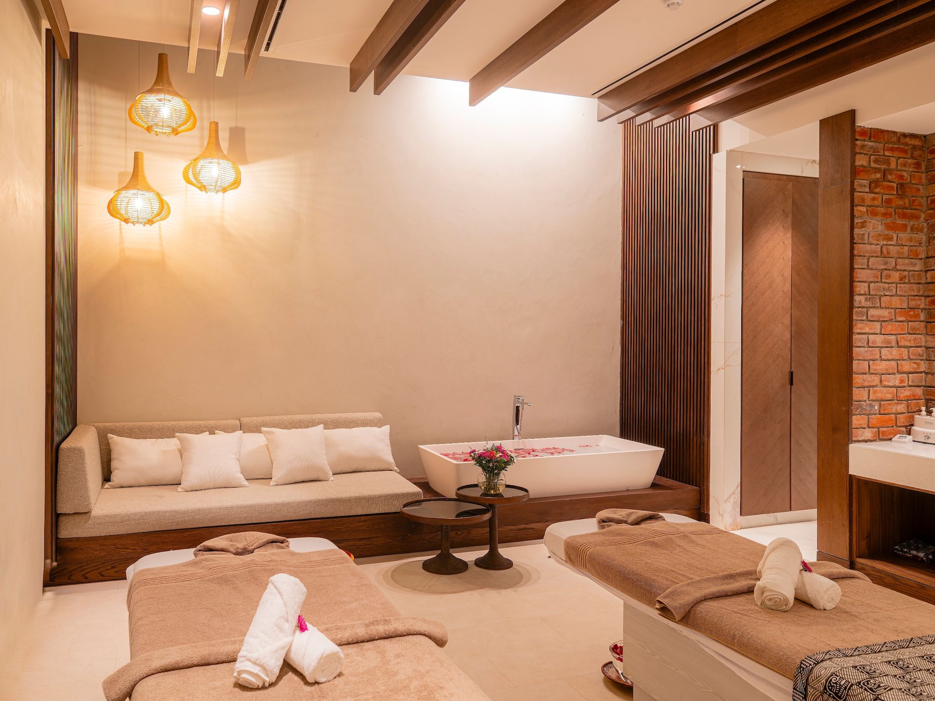 Spa Treatment room in Harare hotel featuring a massage bed and mirror
