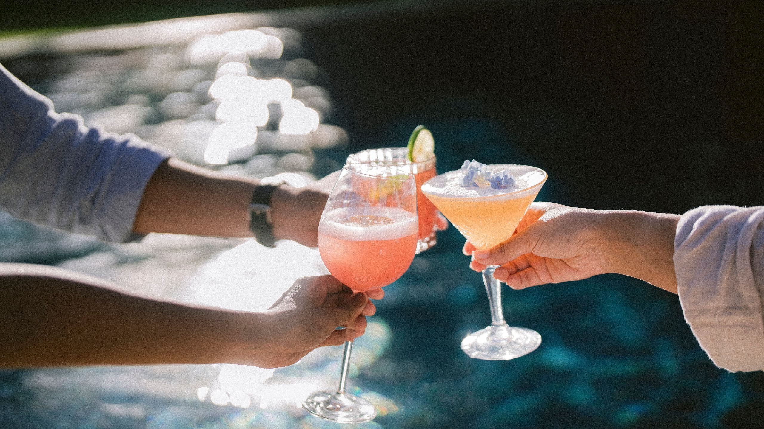 Alila Manggis Cocktail By The Pool With Friends Sunlight