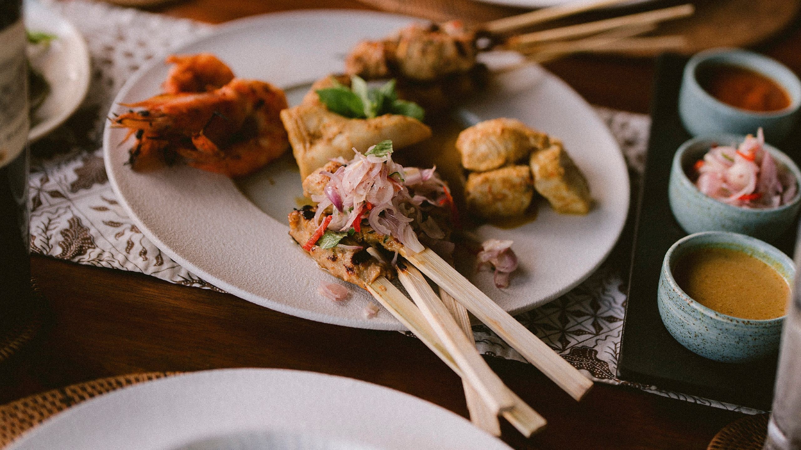 Alila Manggis Seasalt Restaurant Seafood Platter Sate Dish
