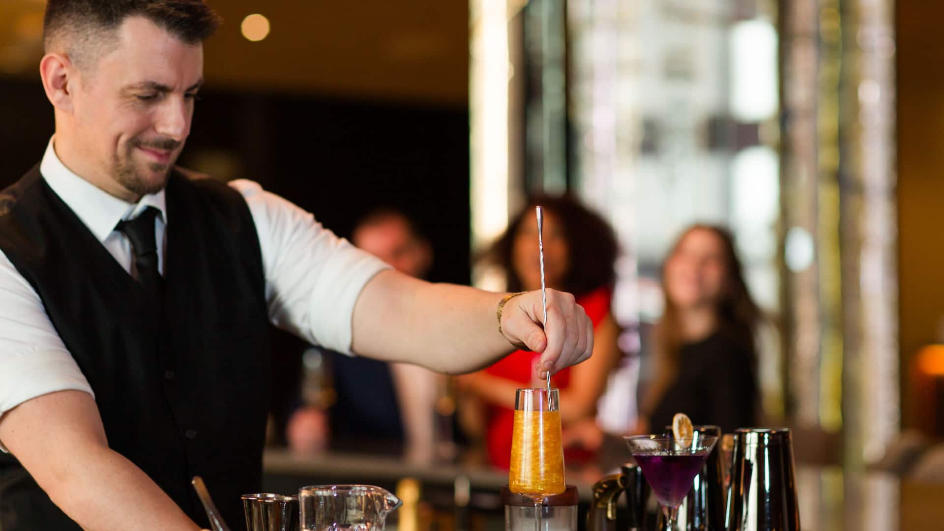 Grand Hyatt Seattle Bartender Mixing Drink