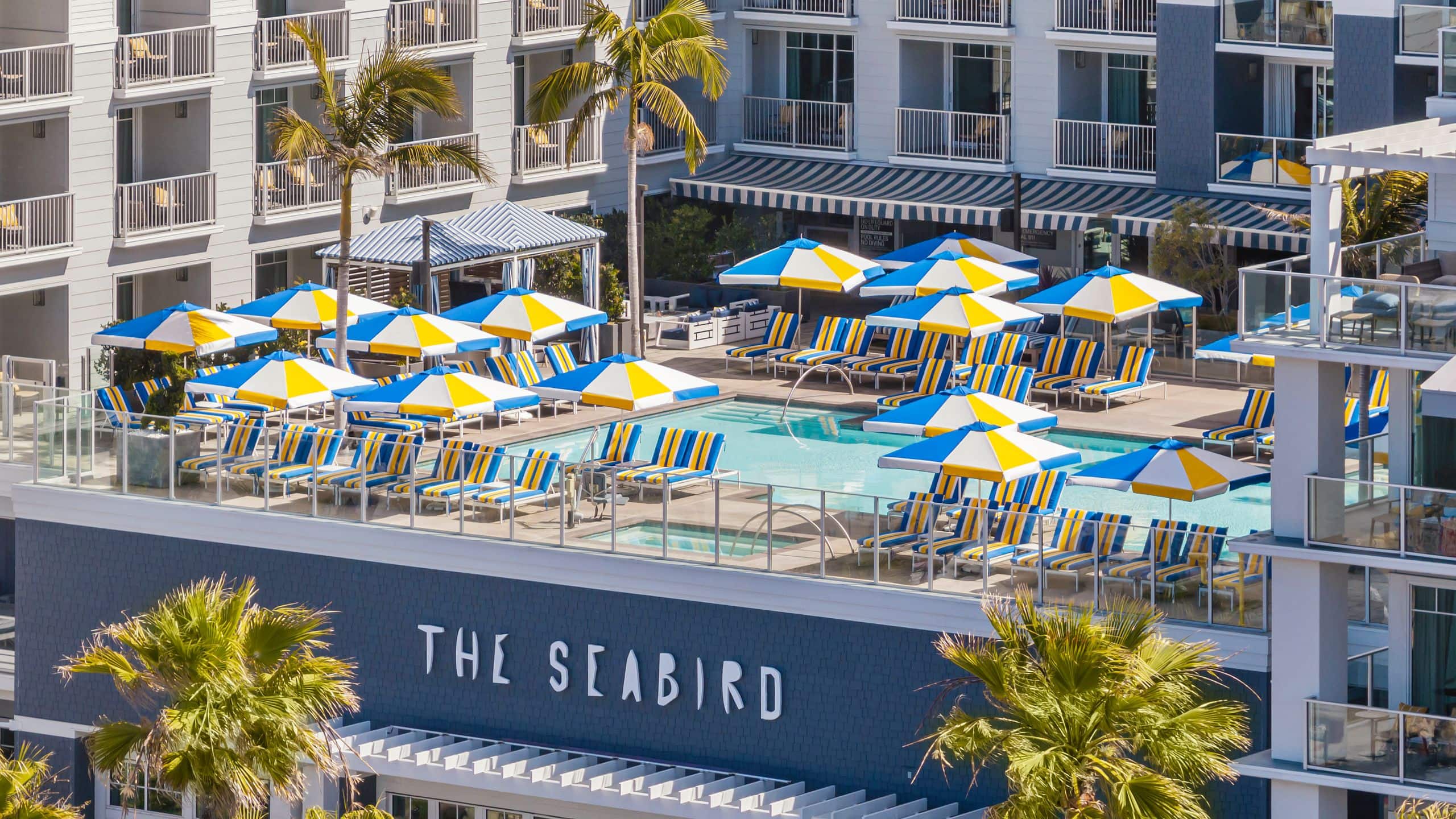 The Seabird Ocean Resort & Spa Pool Front View With Sign