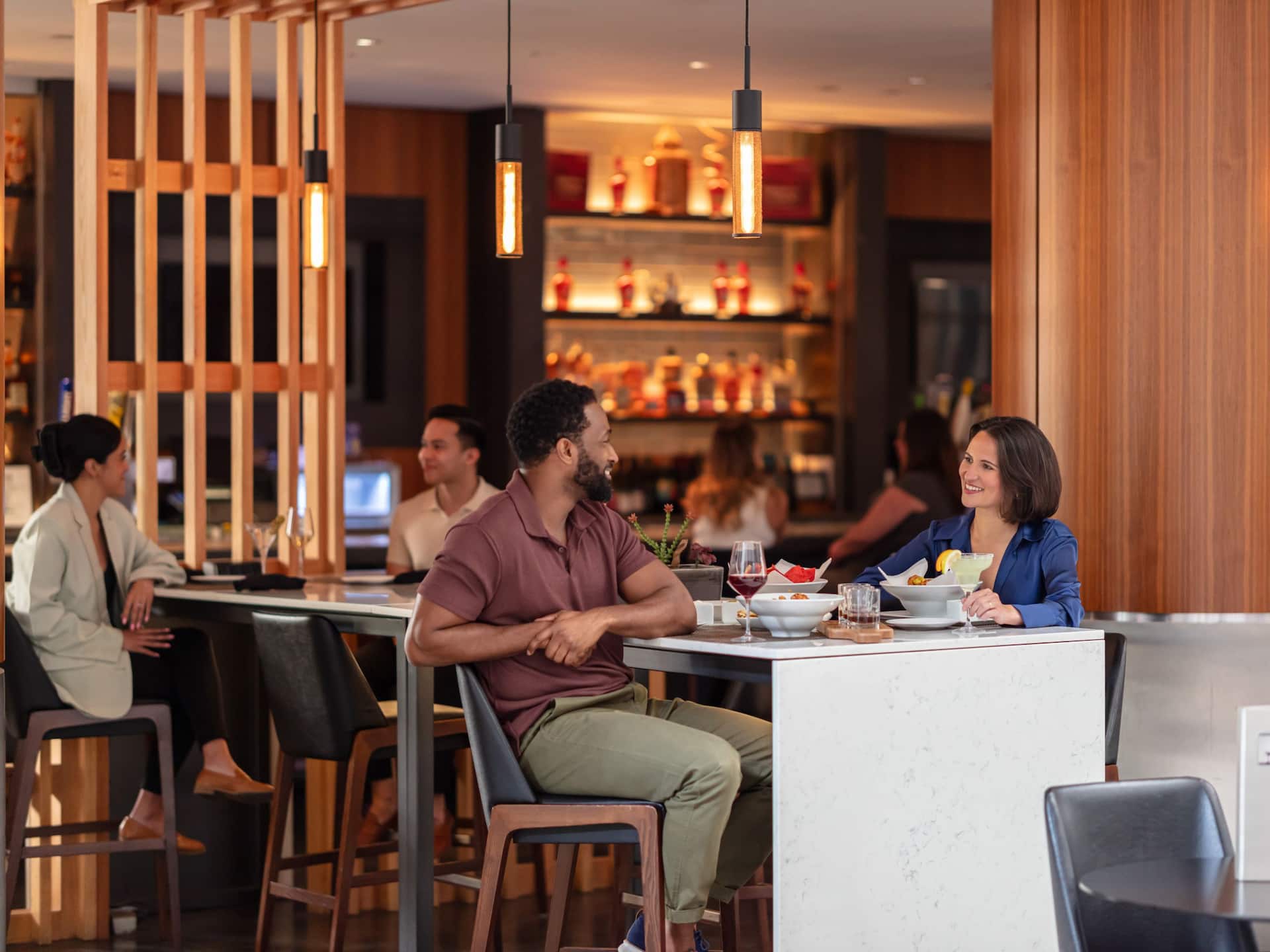 Hyatt Regency Indianapolis Couple Chatting Bar Drinks Food