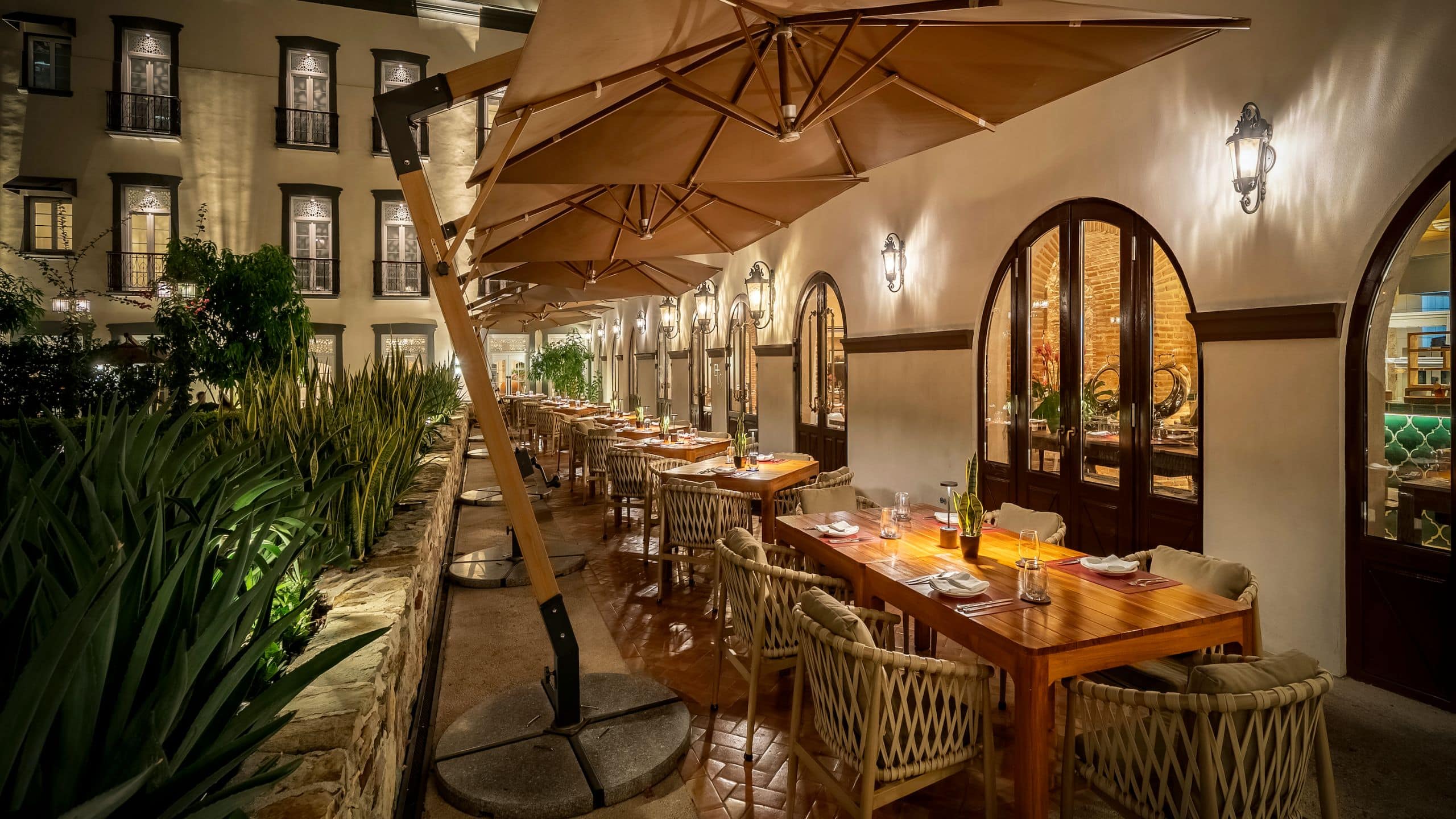 Hotel La Compañia El Santuario Patio Dining Tables