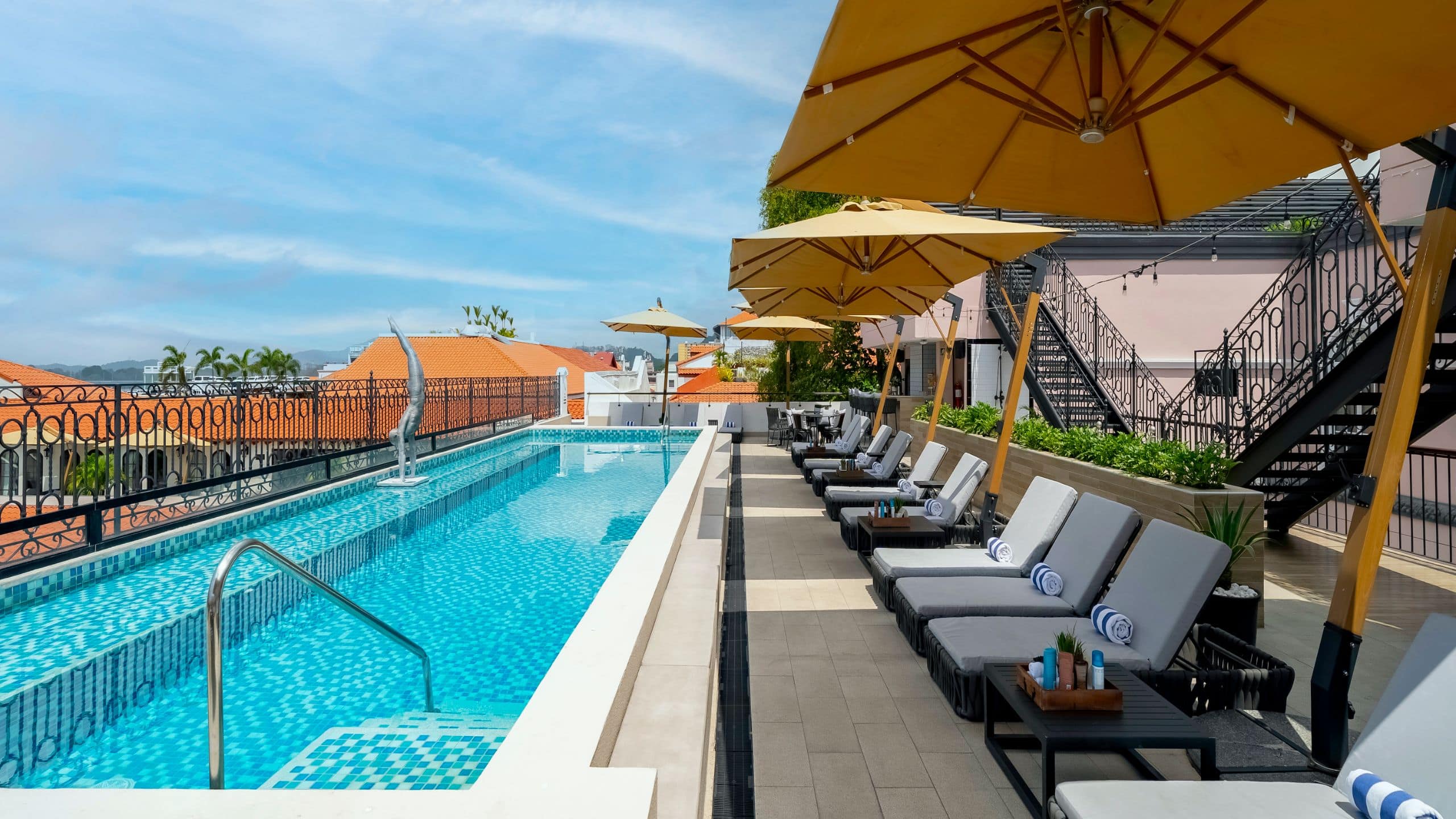 Hotel La Compañia Rooftop Pool Deck Chairs Daytime