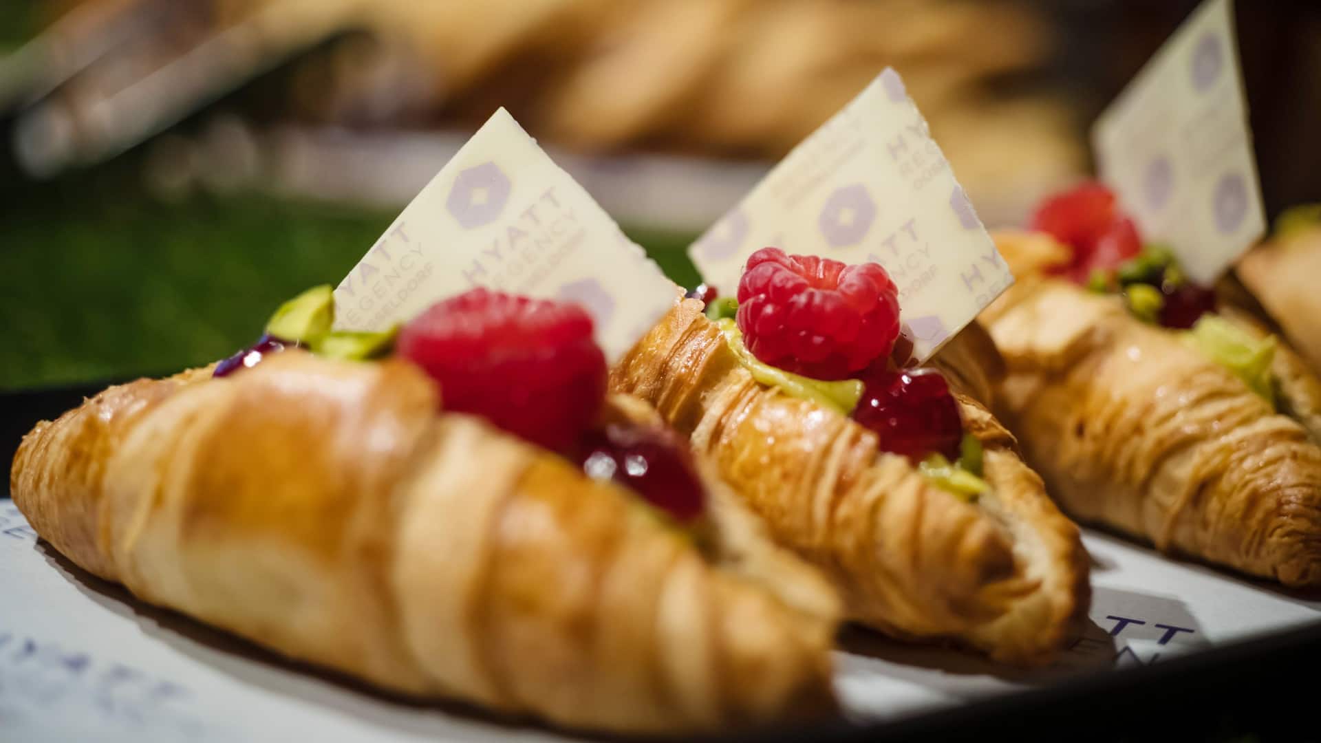 At Hyatt Regency Dusseldorf, croissants with pistachio raspberry filling and chocolate are served during a coffee break
