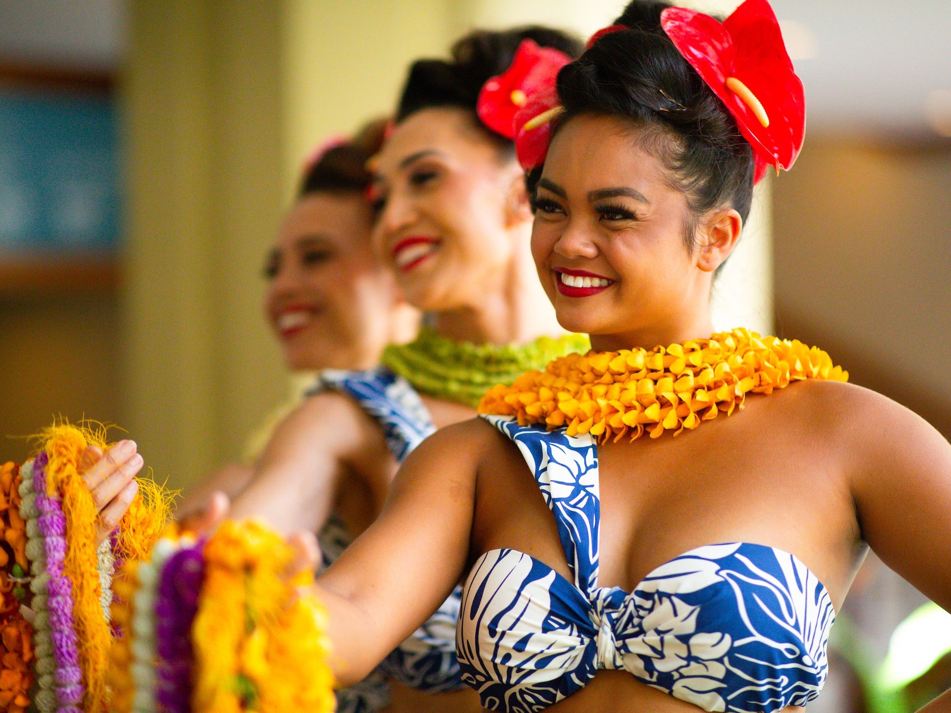 Hyatt Regency Waikiki Beach Resort and Spa Female Hula Dancers Holding A Lei