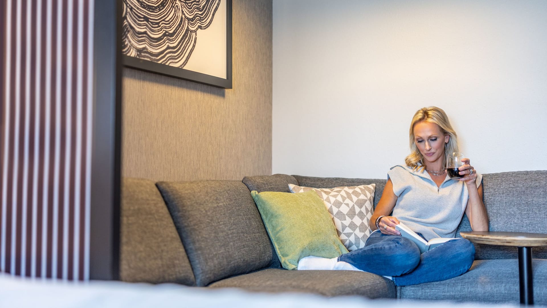 1 of 1 Hyatt Place  HP_P0582 Woman Market Guestroom Cozy Corner Leisure
