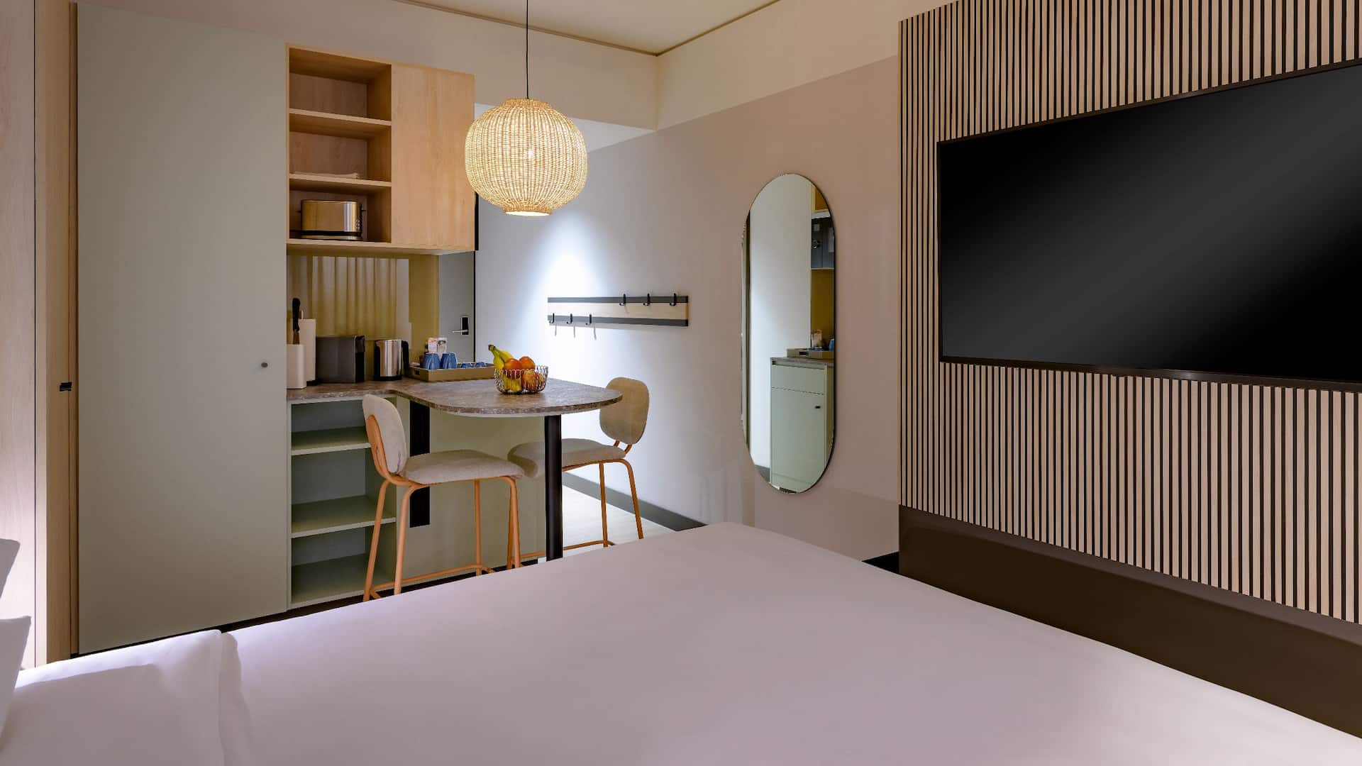 Hyatt House Frankfurt Goetheplatz Guestroom King Bed Kitchenette Side View