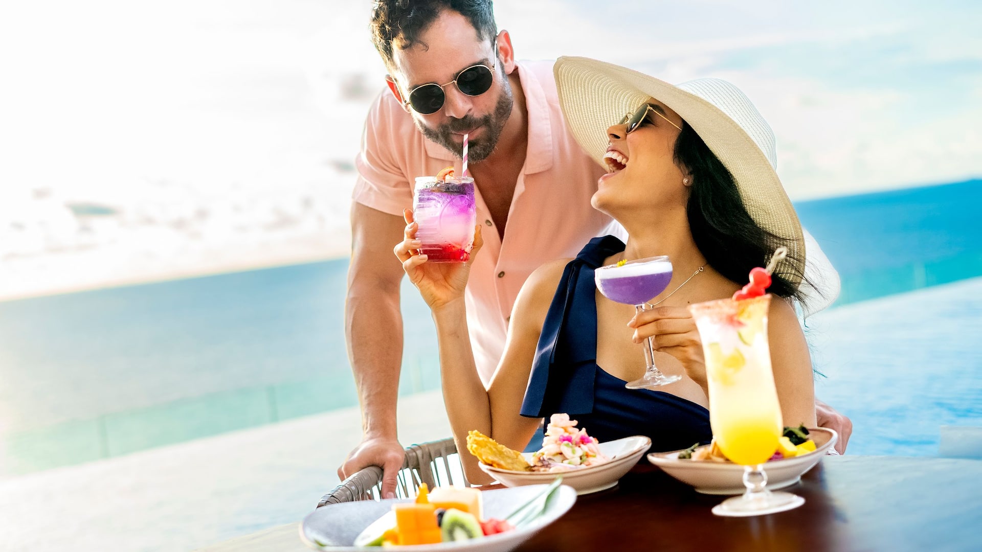 Hyatt Regency Cartagena Couple With Cocktails In The Pool