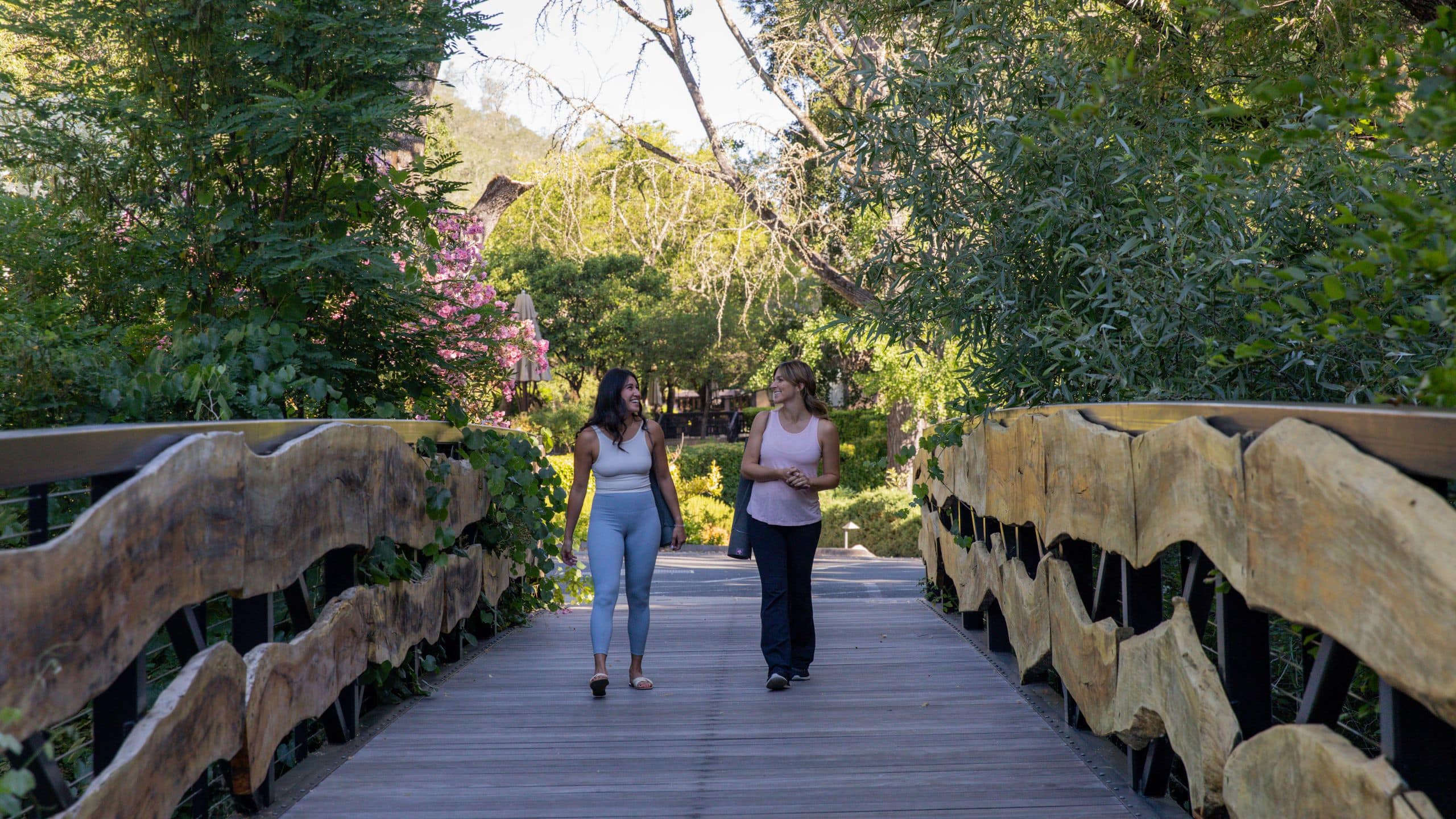 Alila Napa Valley Guests Walking On Bridge