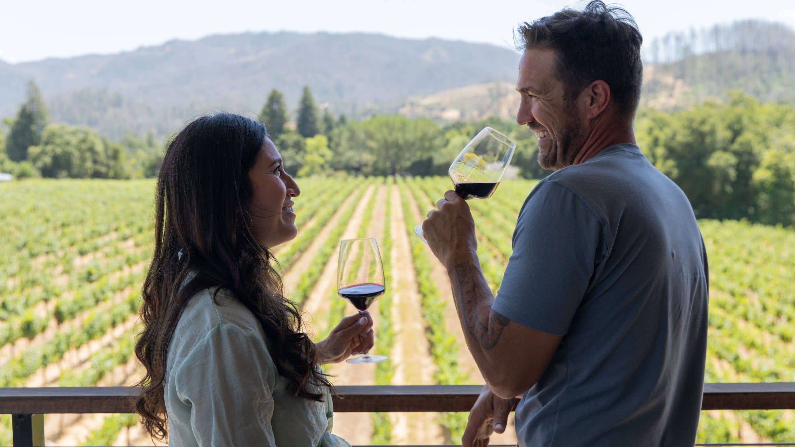 Alila Napa Valley Vineyard View Couple With Wine Cheers