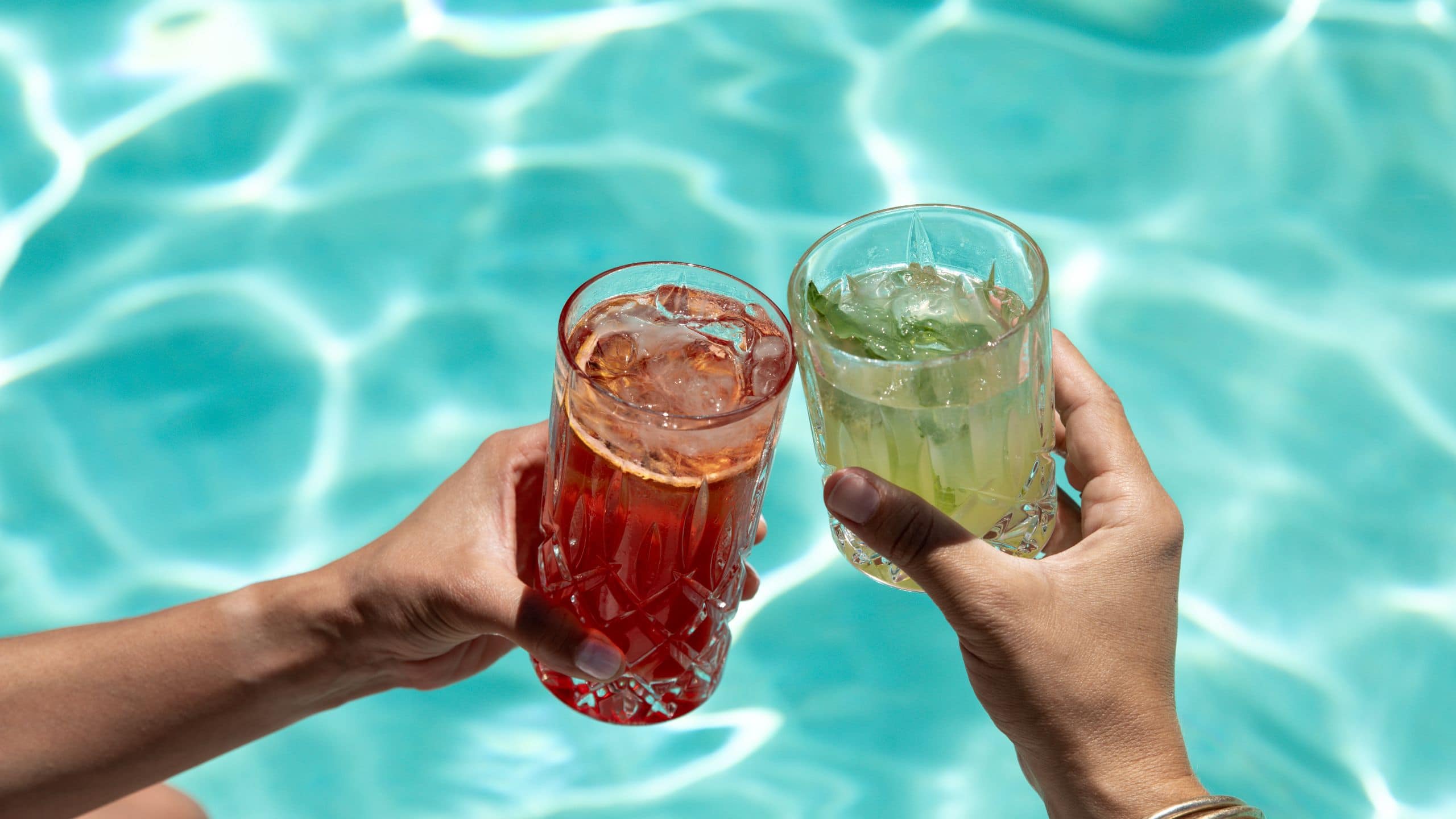 Alila Napa Valley Cocktail Cheers At Pool Close Up