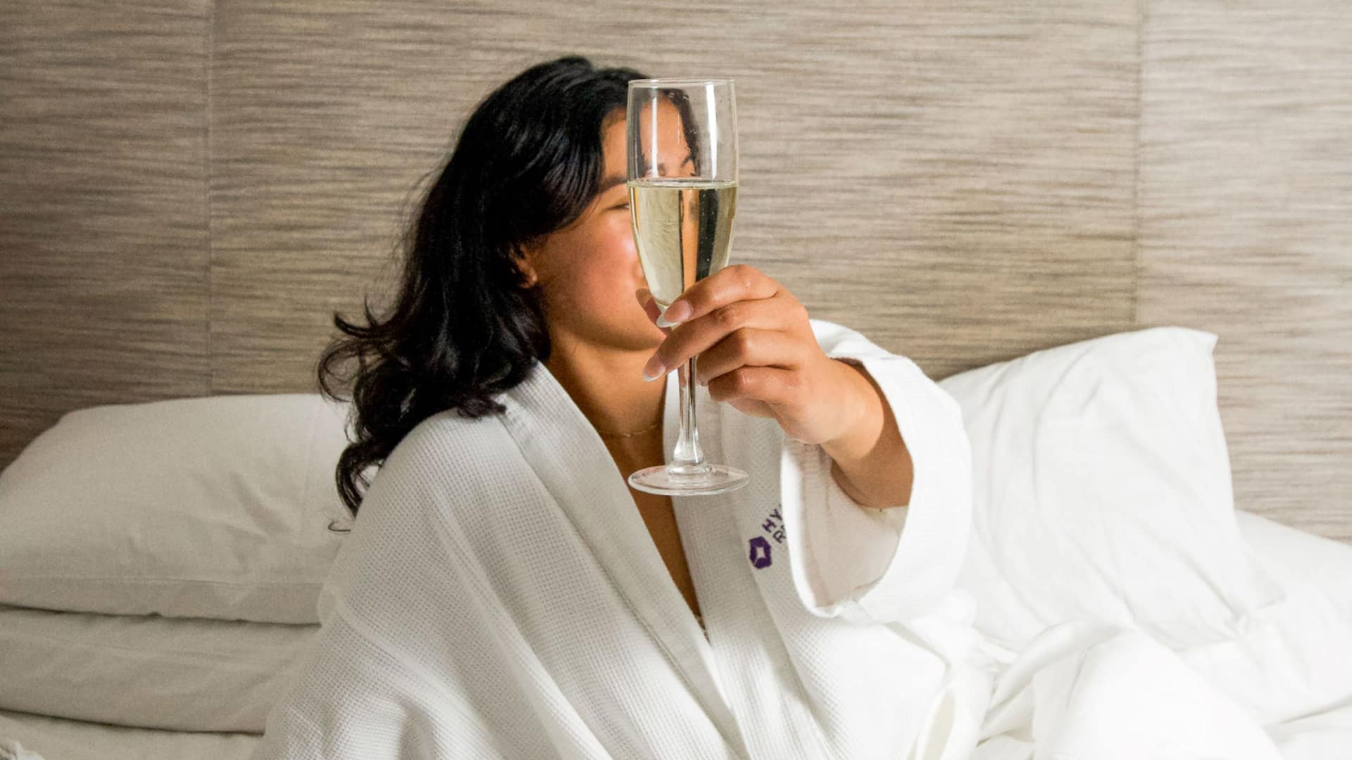 Hyatt Regency Long Beach Woman Guestroom Champagne